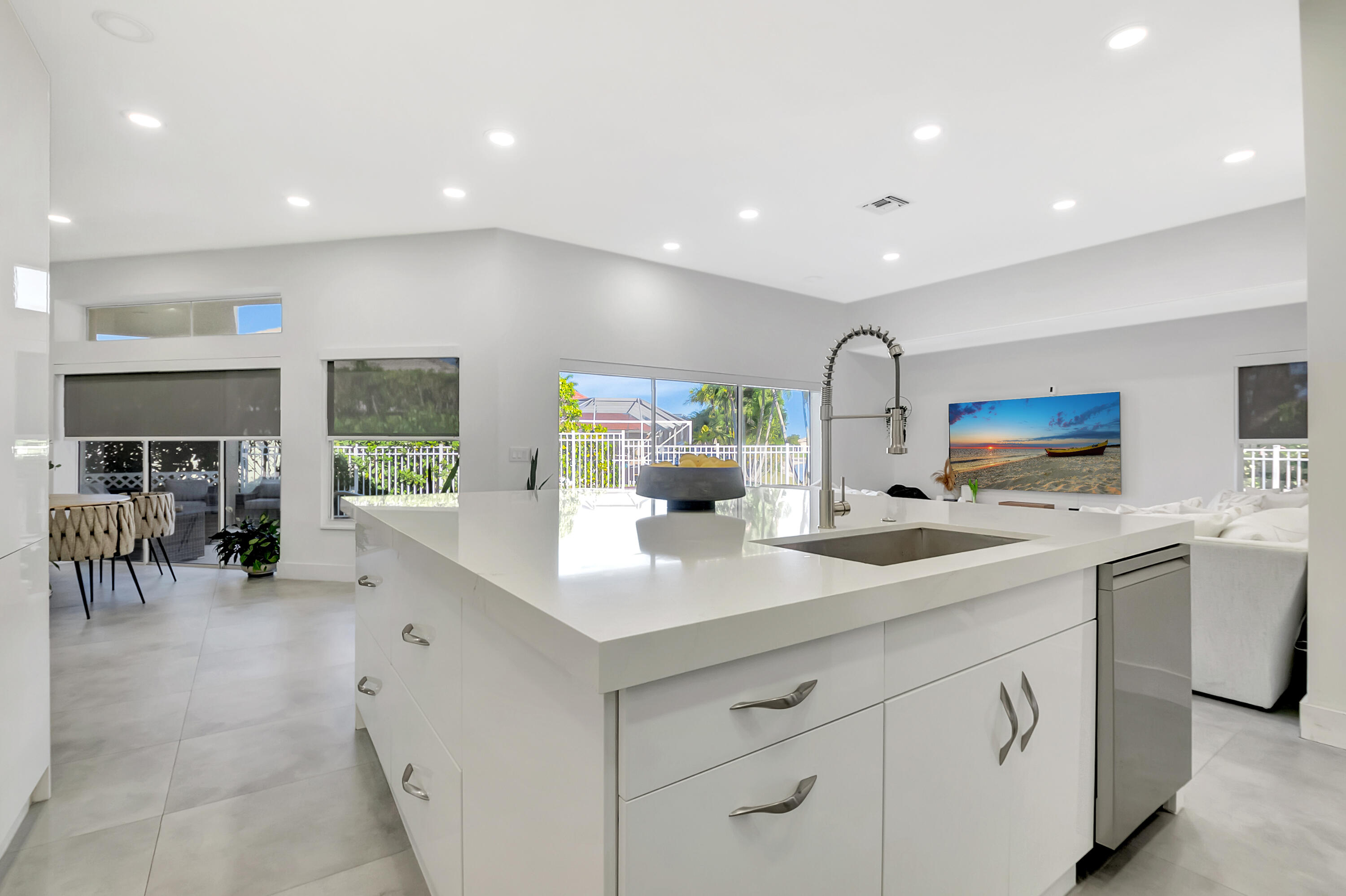 22330 Kettle Creek Way Boca Raton, FL 33428 - Photo 5 of 75 a kitchen with sink and white cabinets
