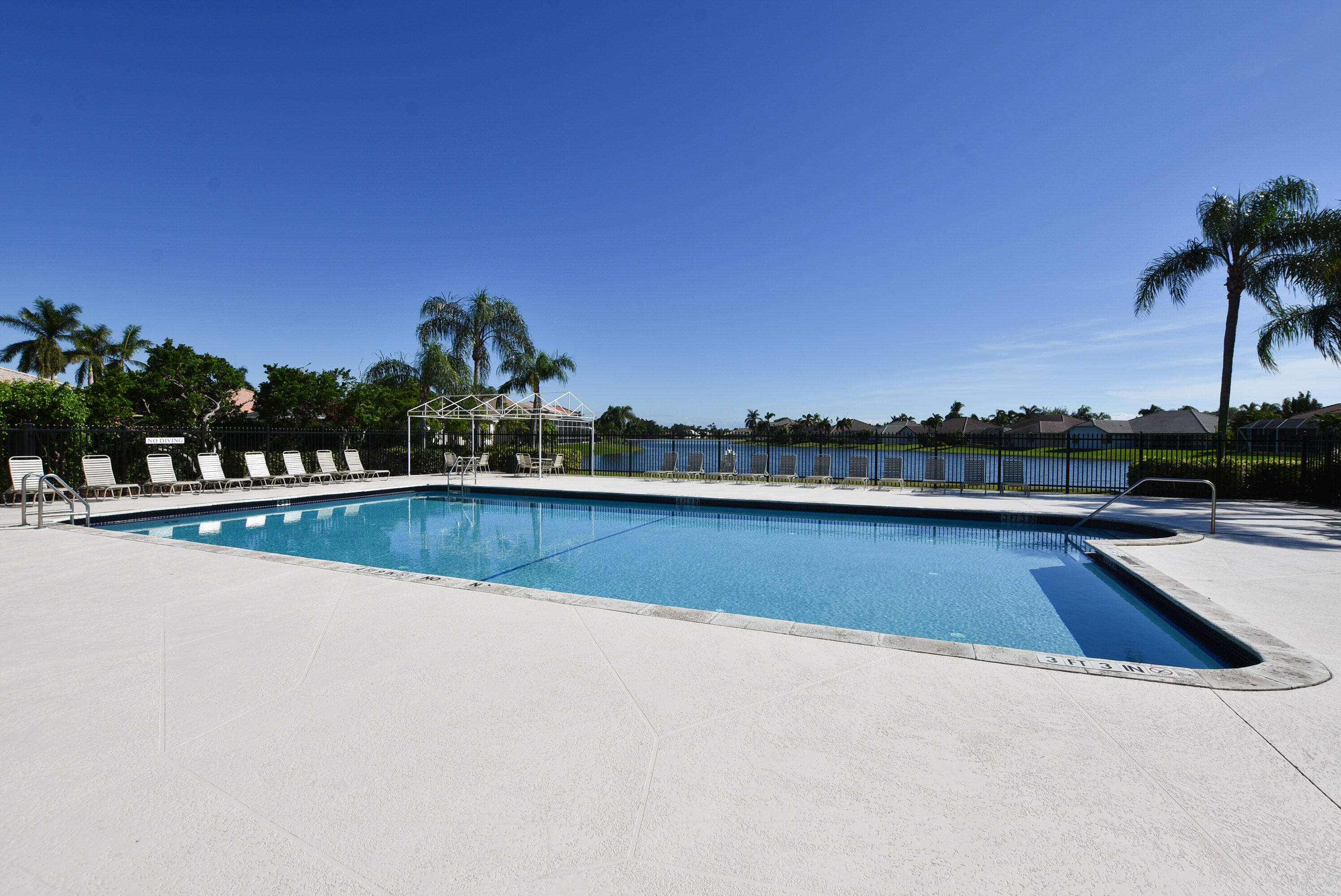 22330 Kettle Creek Way Boca Raton, FL 33428 - Photo 53 of 75 a view of swimming pool with outdoor seating