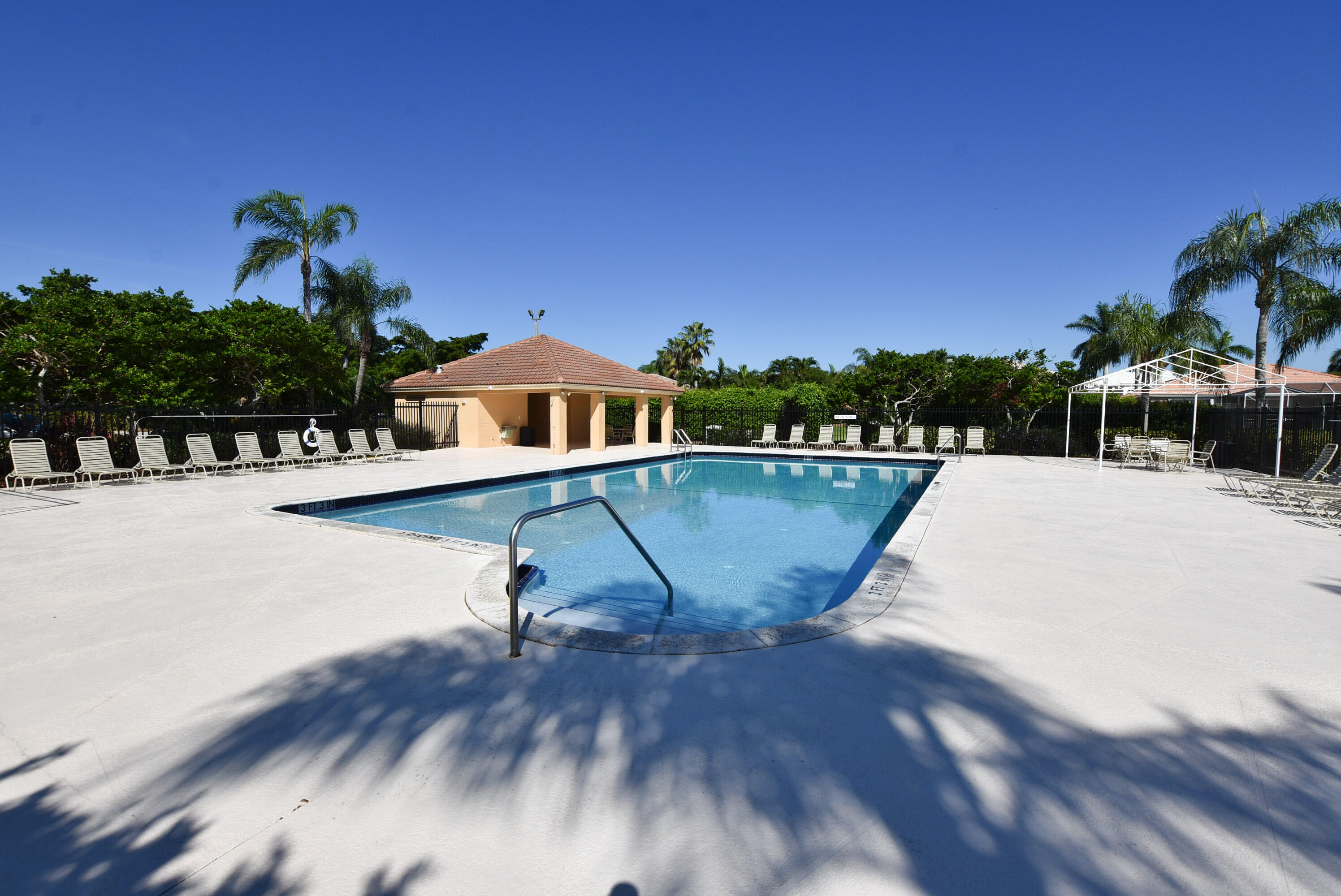 22330 Kettle Creek Way Boca Raton, FL 33428 - Photo 54 of 75 a view of a swimming pool with a patio