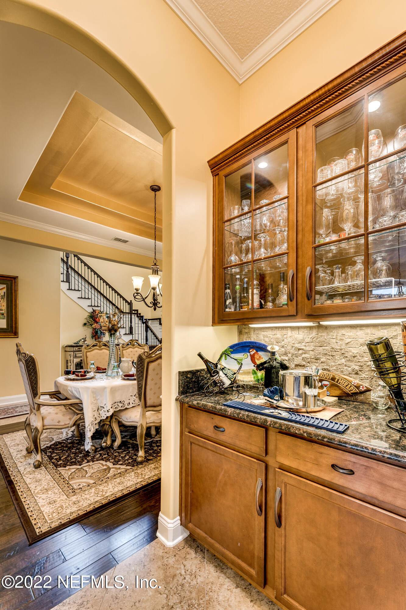 571 Saddlestone Drive Jacksonville, FL 32259 - Photo 24 of 65 a kitchen with stainless steel appliances kitchen island granite countertop a stove and a sink