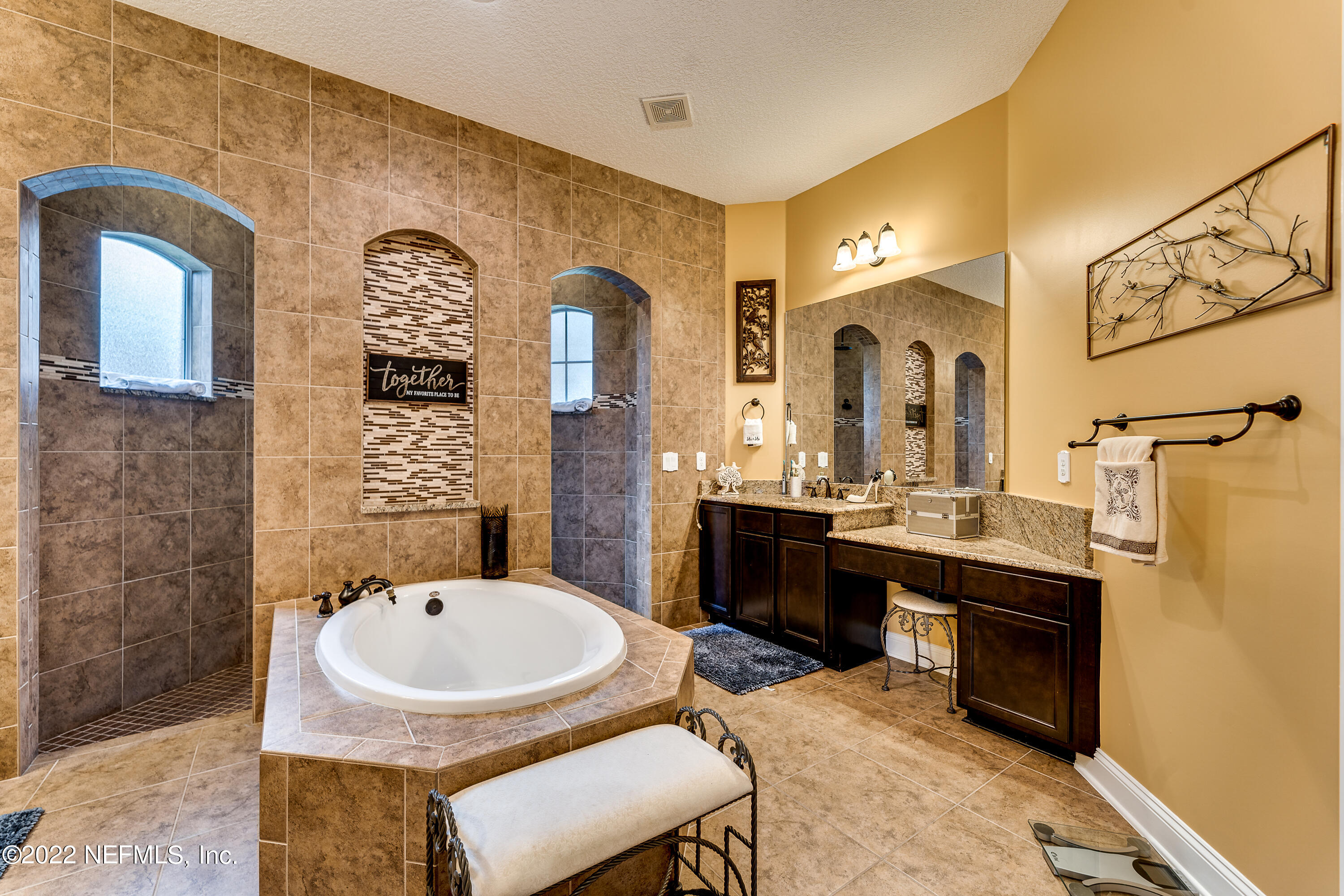 571 Saddlestone Drive Jacksonville, FL 32259 - Photo 30 of 65 a bathroom with a sink and a mirror