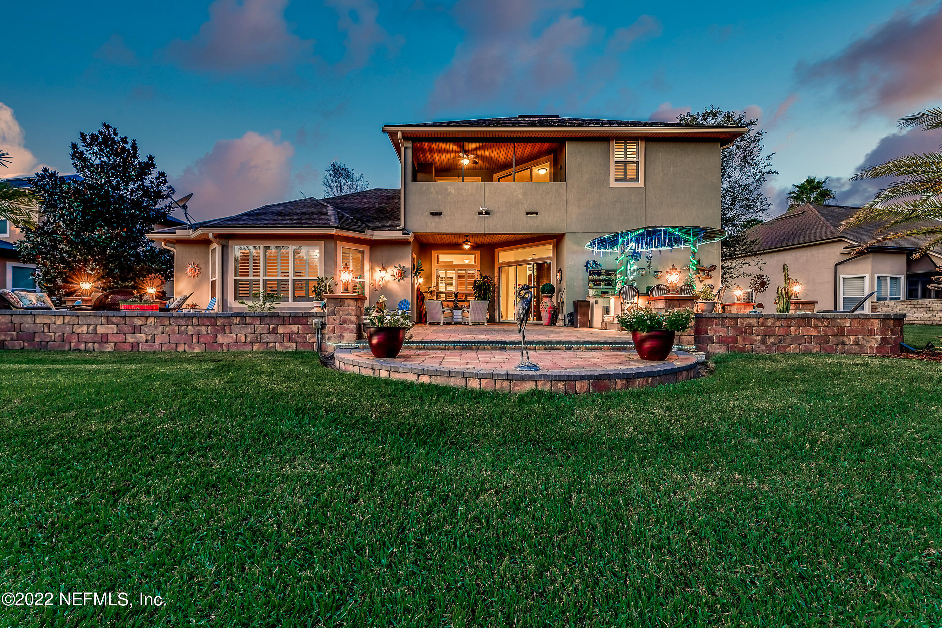 571 Saddlestone Drive Jacksonville, FL 32259 - Photo 52 of 65 a front view of a house with a yard table and chairs