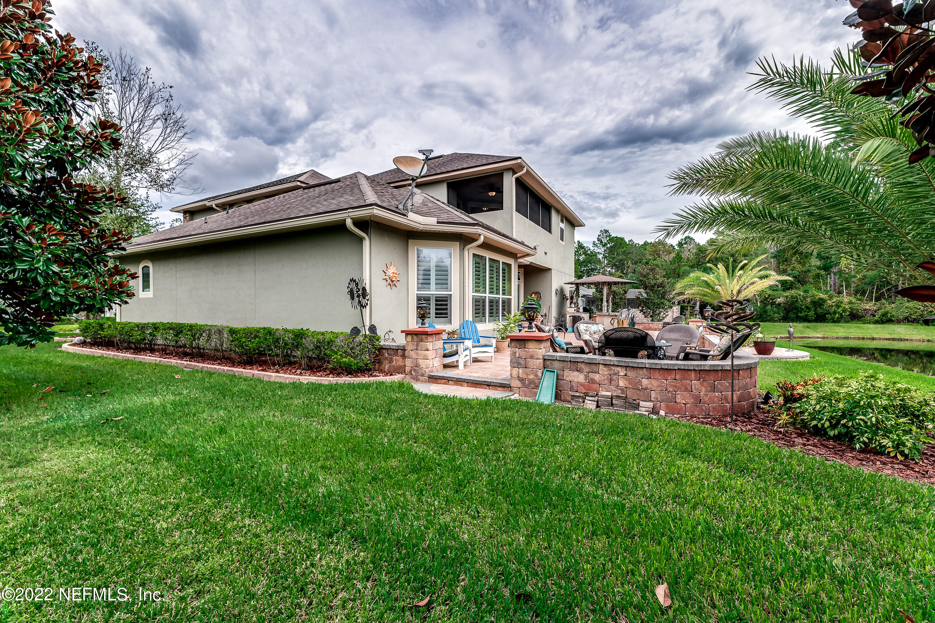 571 Saddlestone Drive Jacksonville, FL 32259 - Photo 57 of 65 a patio with table and chairs