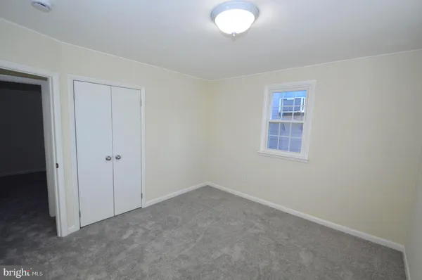 an empty room with a workbench