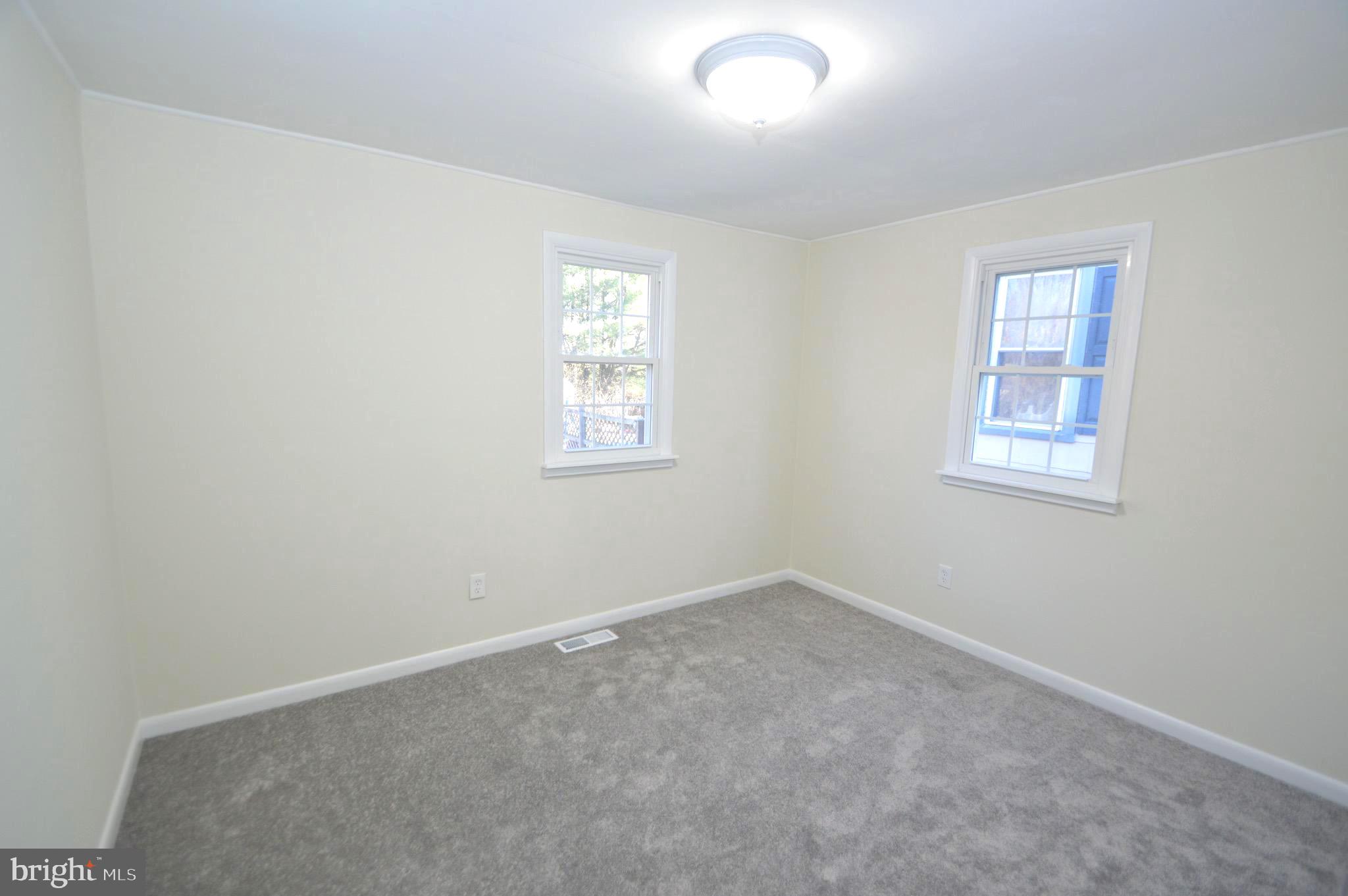 267 Mott Avenue Burlington, NJ 08016 - Photo 12 of 18 an empty room with windows