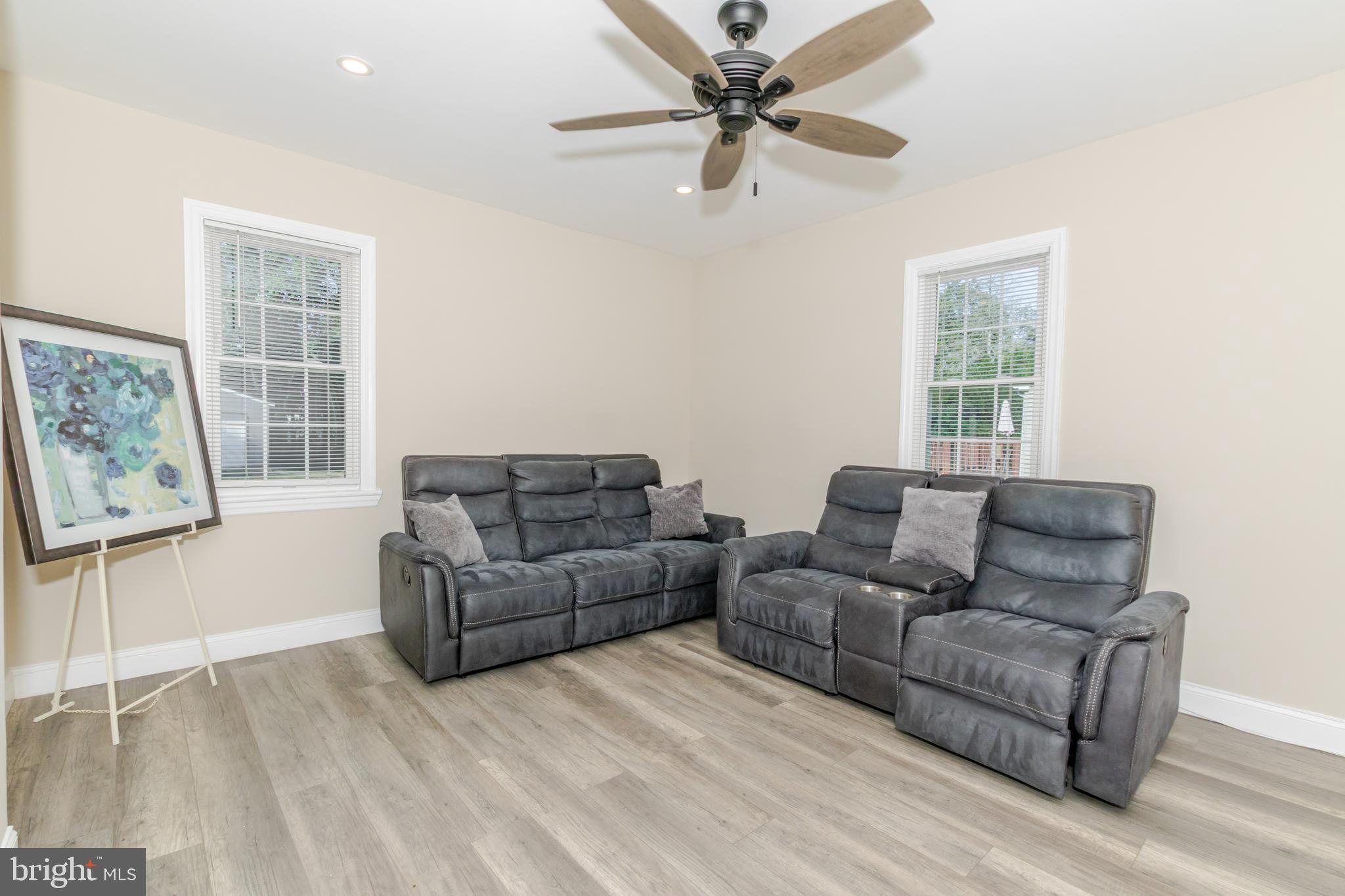 100 North 1st Road Hammonton, NJ 08037 - Photo 12 of 47 a living room with furniture and a window