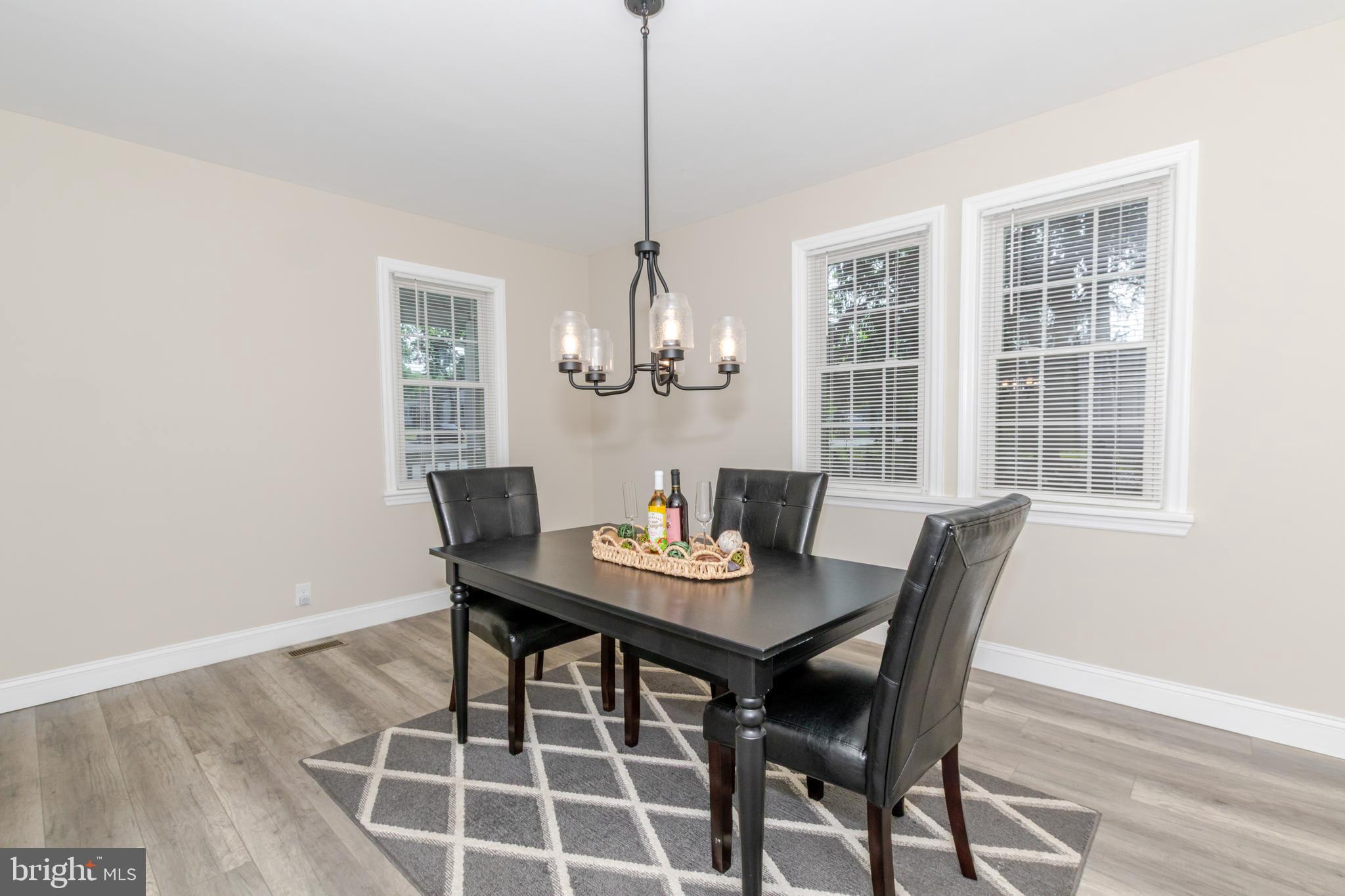 100 North 1st Road Hammonton, NJ 08037 - Photo 15 of 47 a view of a dining room with a table and chairs