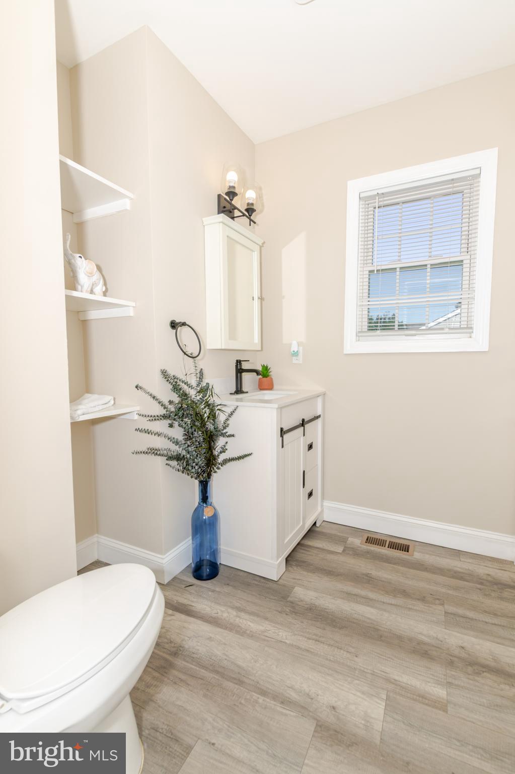 100 North 1st Road Hammonton, NJ 08037 - Photo 18 of 47 a bathroom with a toilet sink and mirror