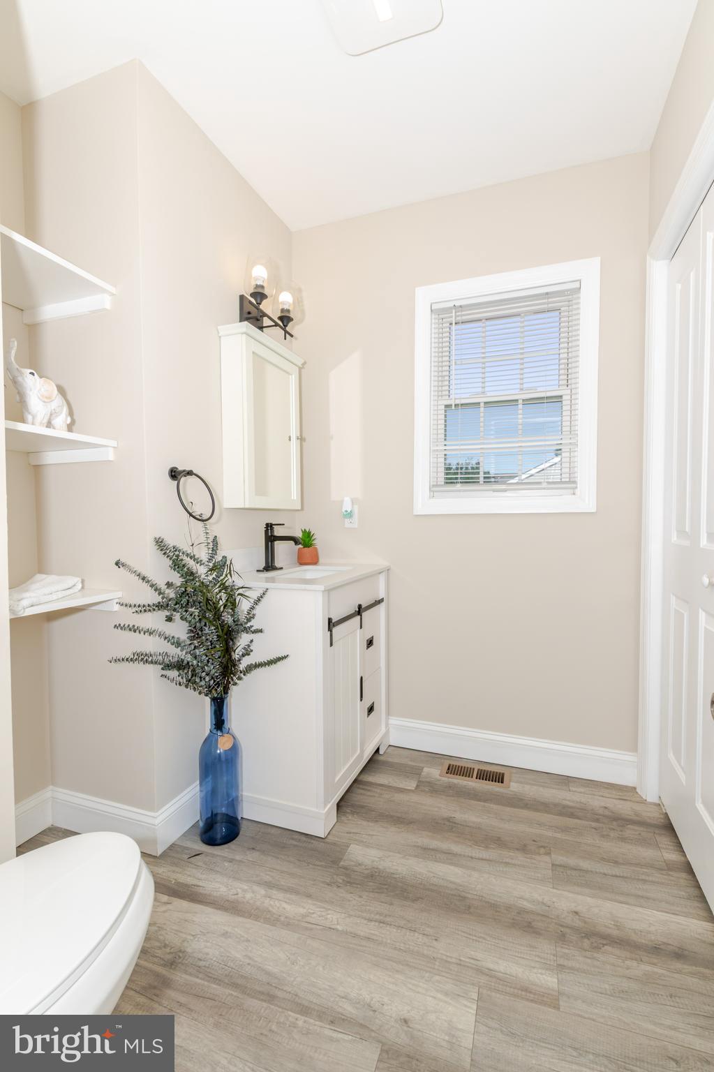 100 North 1st Road Hammonton, NJ 08037 - Photo 20 of 47 a bathroom with a sink and a mirror