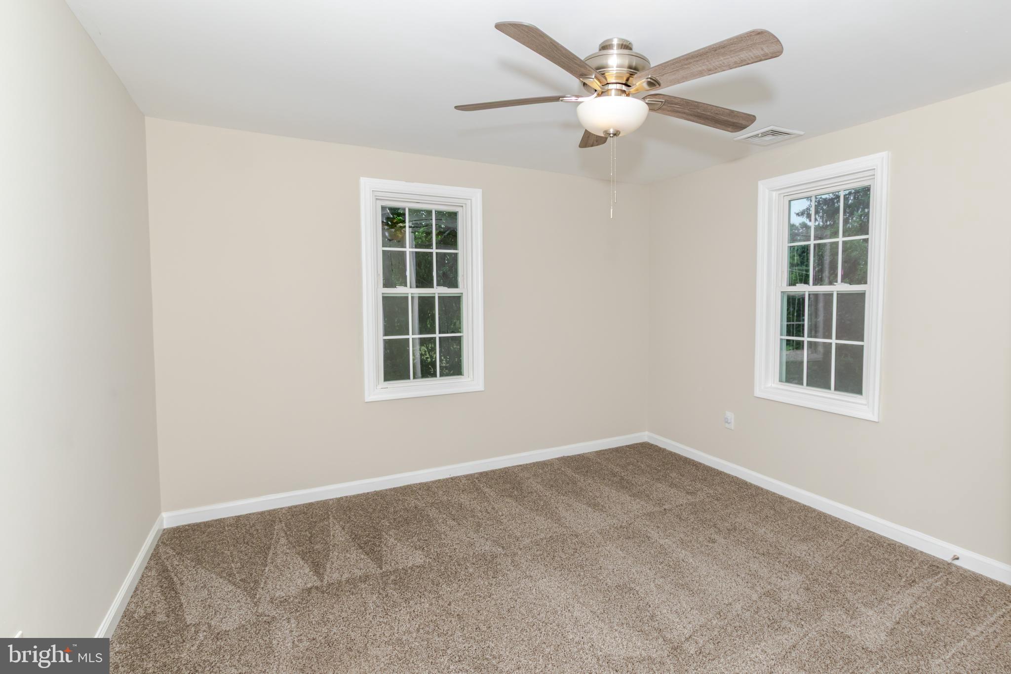 100 North 1st Road Hammonton, NJ 08037 - Photo 28 of 47 an empty room with windows and fan