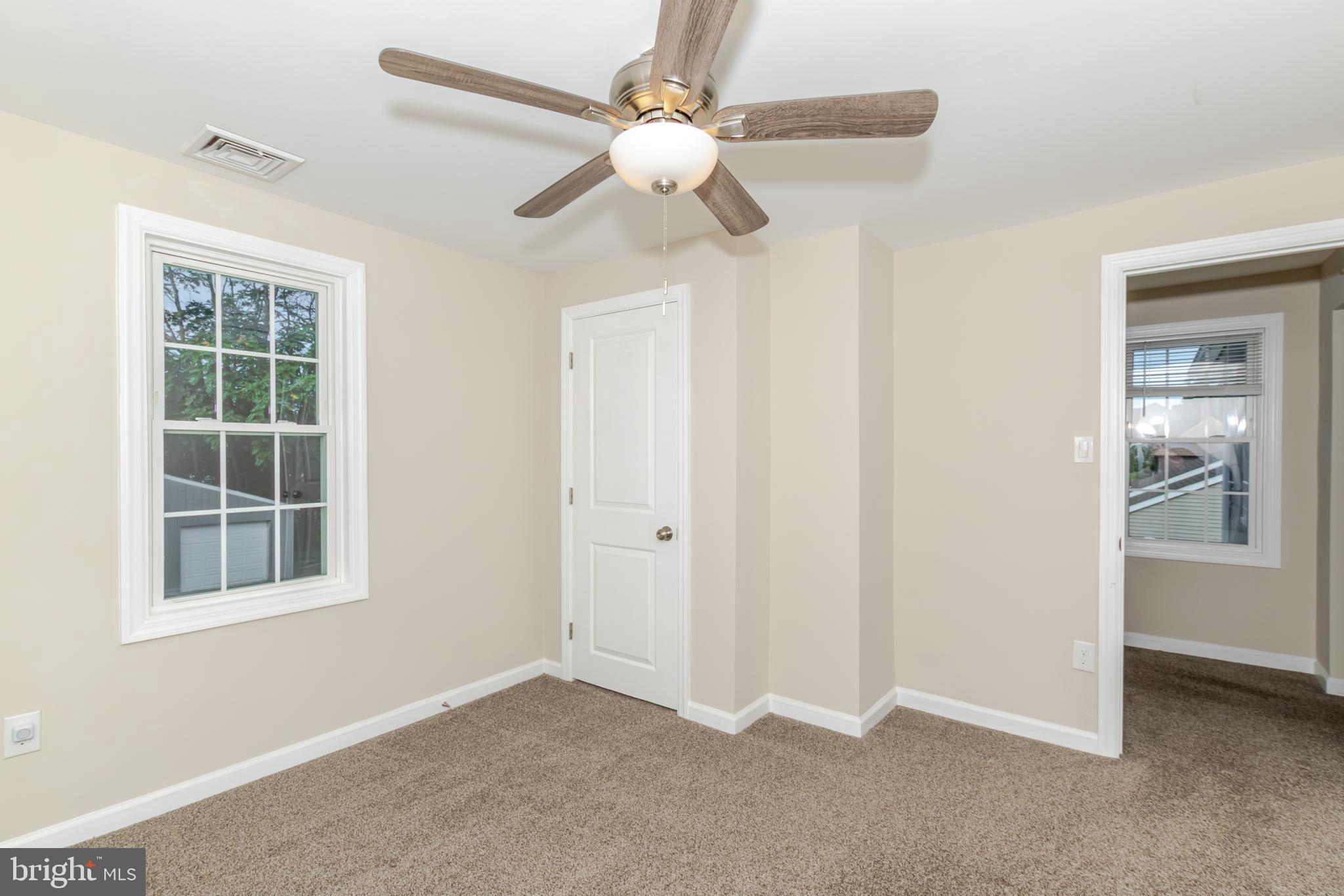 100 North 1st Road Hammonton, NJ 08037 - Photo 30 of 47 an empty room with windows and fan