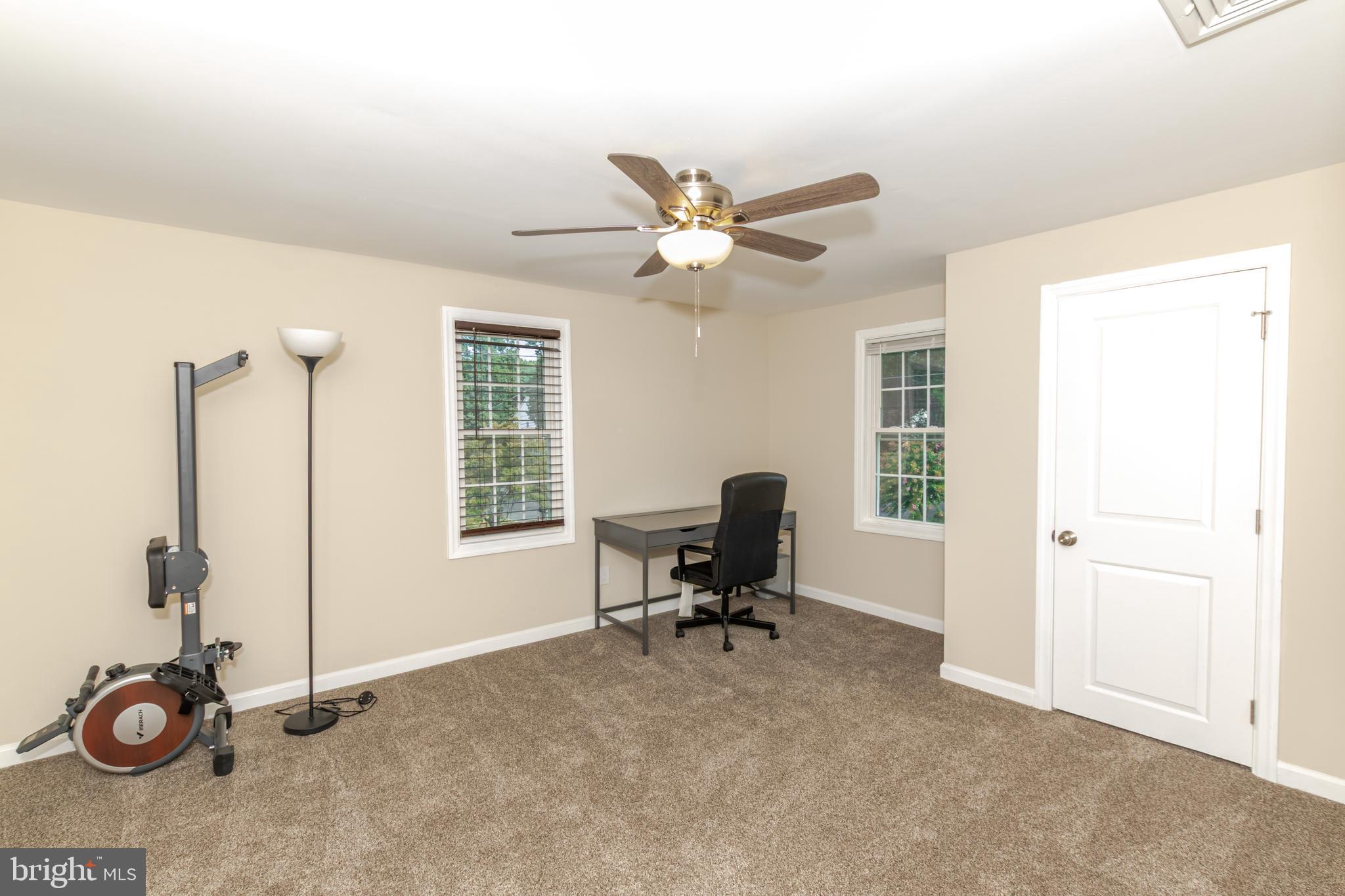 100 North 1st Road Hammonton, NJ 08037 - Photo 32 of 47 a view of workspace with a window and gym equipment