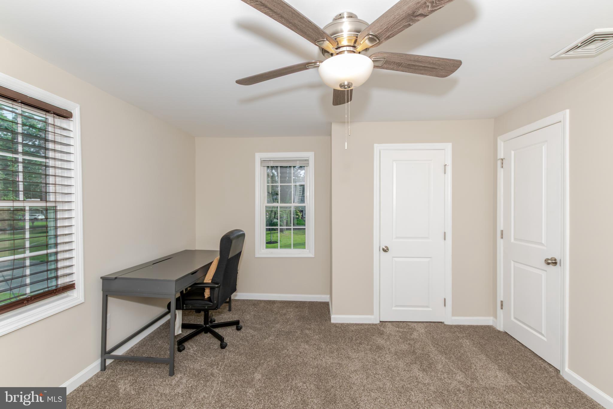 100 North 1st Road Hammonton, NJ 08037 - Photo 36 of 47 a view of a workspace with furniture and a window