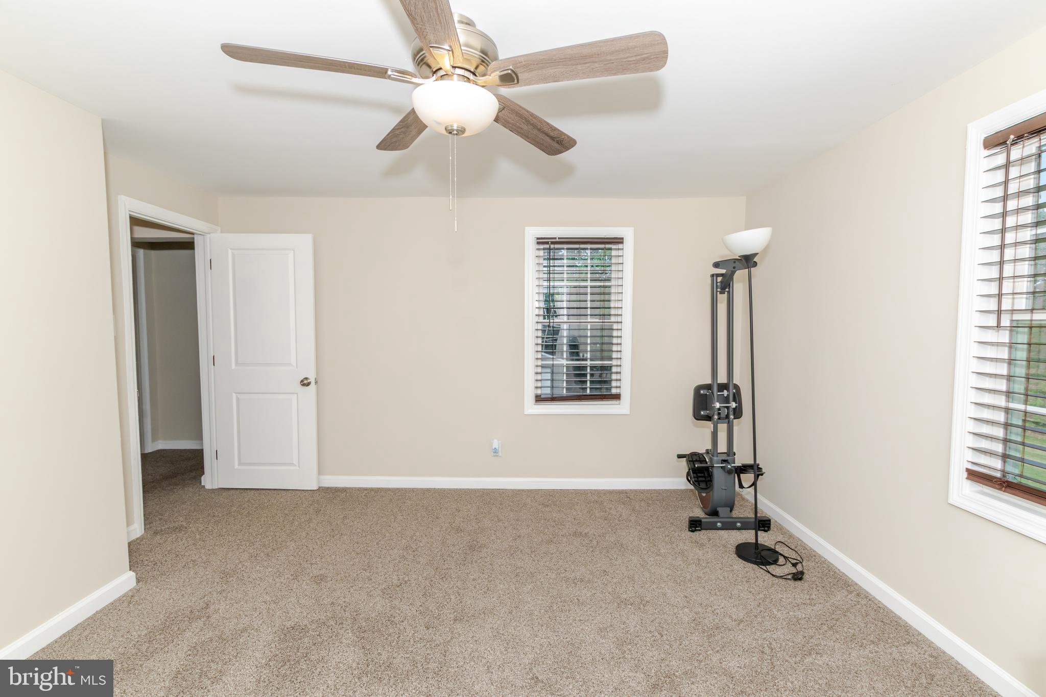 100 North 1st Road Hammonton, NJ 08037 - Photo 38 of 47 an empty room with windows and fan