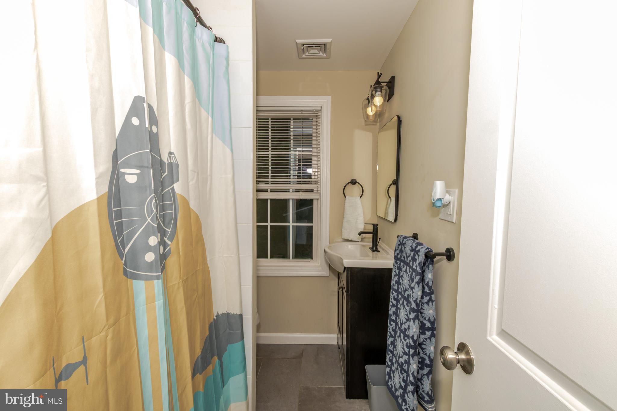 100 North 1st Road Hammonton, NJ 08037 - Photo 39 of 47 a bathroom with a granite countertop shower and a mirror