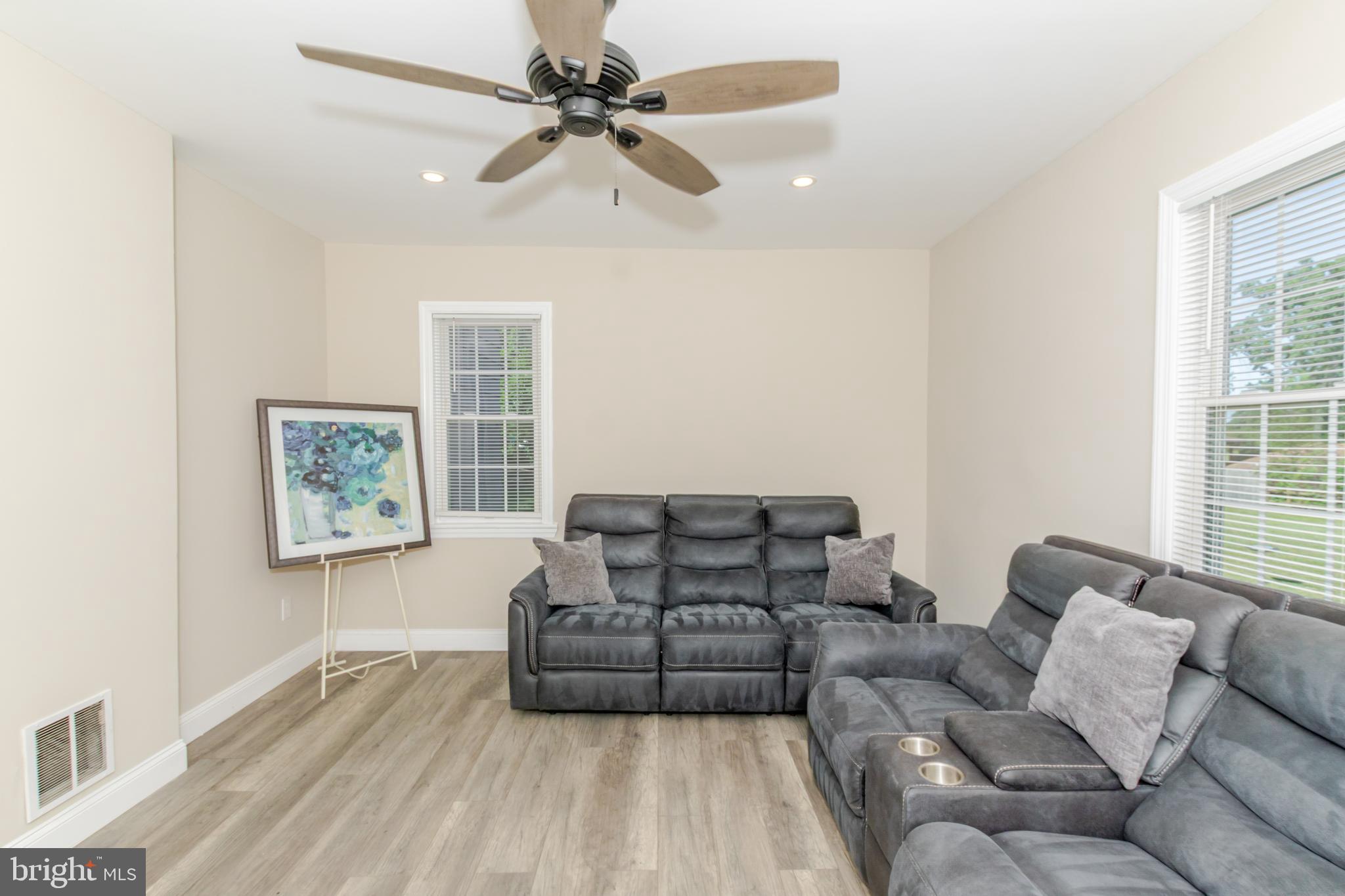 100 North 1st Road Hammonton, NJ 08037 - Photo 9 of 47 a living room with furniture and a window
