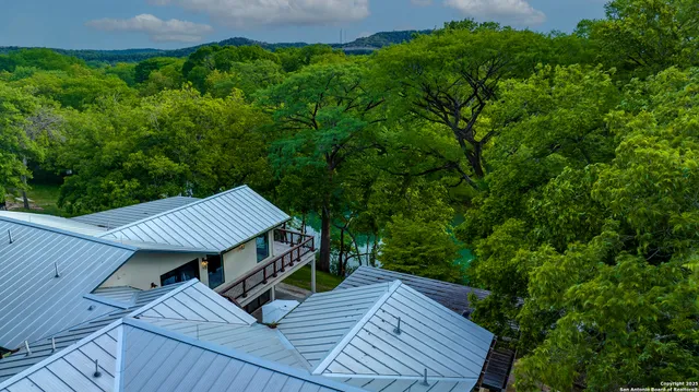 a view of a dining area with furniture and wooden floor