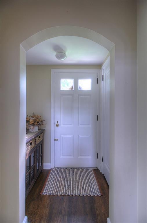 140 Oakville Road Beaver Falls, PA 15010 - Photo 5 of 25 Warm, neutral palette in the Entry showcases the architectural details...Archways, custom trim, rich hardwood flooring!