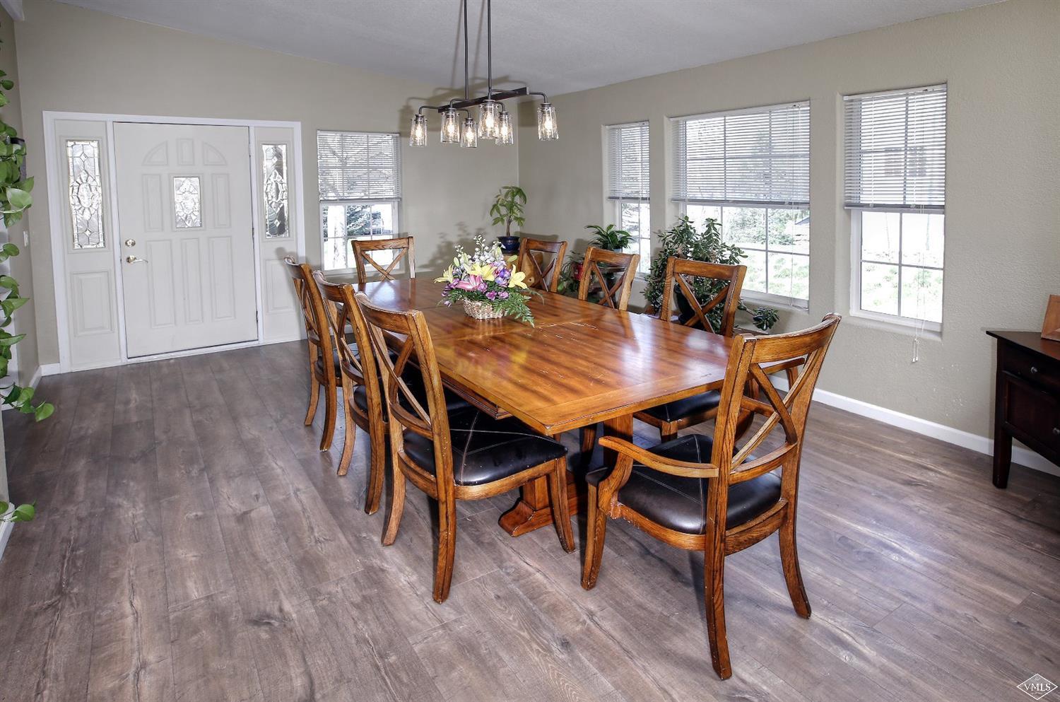 134 Ringneck Eagle, CO 81631 - Photo 12 of 25 a view of a dining room with furniture window and wooden floor
