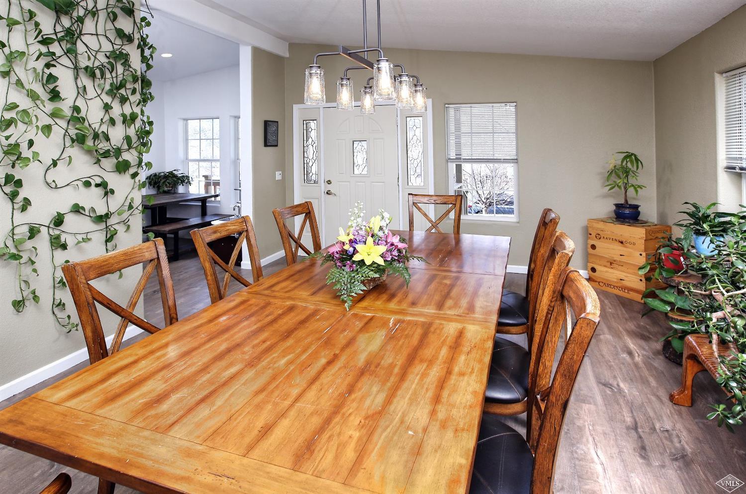 134 Ringneck Eagle, CO 81631 - Photo 13 of 25 a dining room with stainless steel appliances furniture a chandelier and a rug