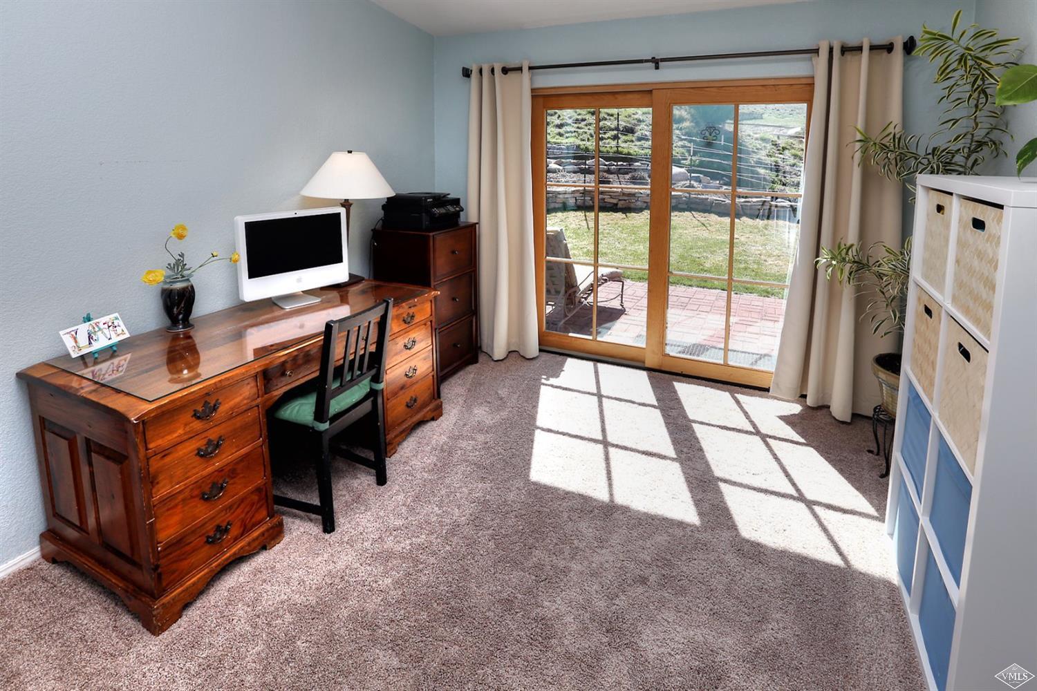 134 Ringneck Eagle, CO 81631 - Photo 20 of 25 a room with furniture and a flat screen tv