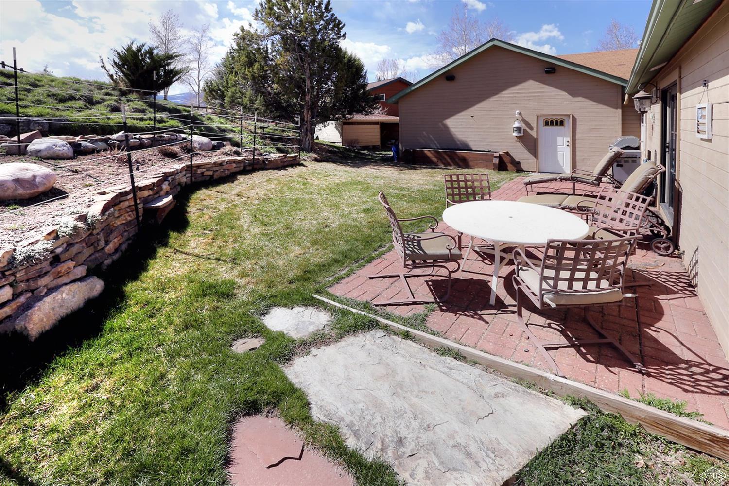 134 Ringneck Eagle, CO 81631 - Photo 3 of 25 a view of a patio with chair and table