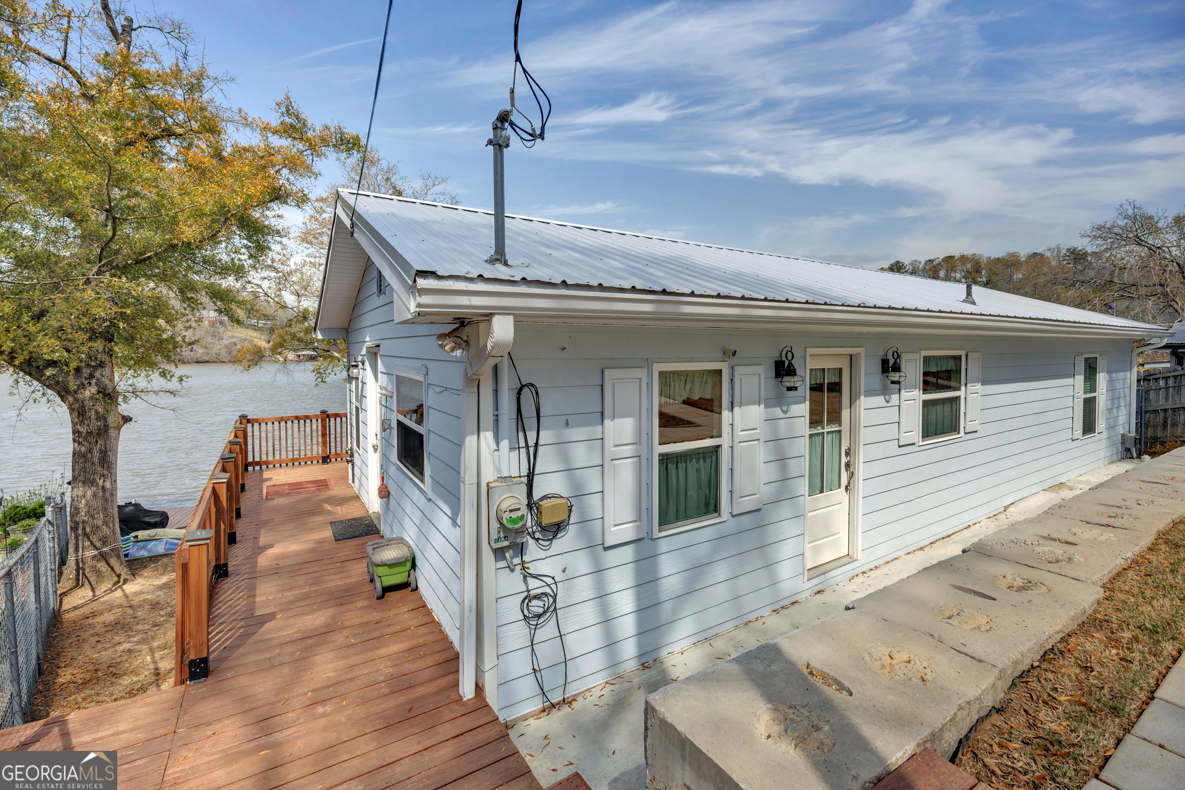 411 Alcovy Road Mansfield, GA 30055 - Photo 11 of 49 a front view of a house with a porch