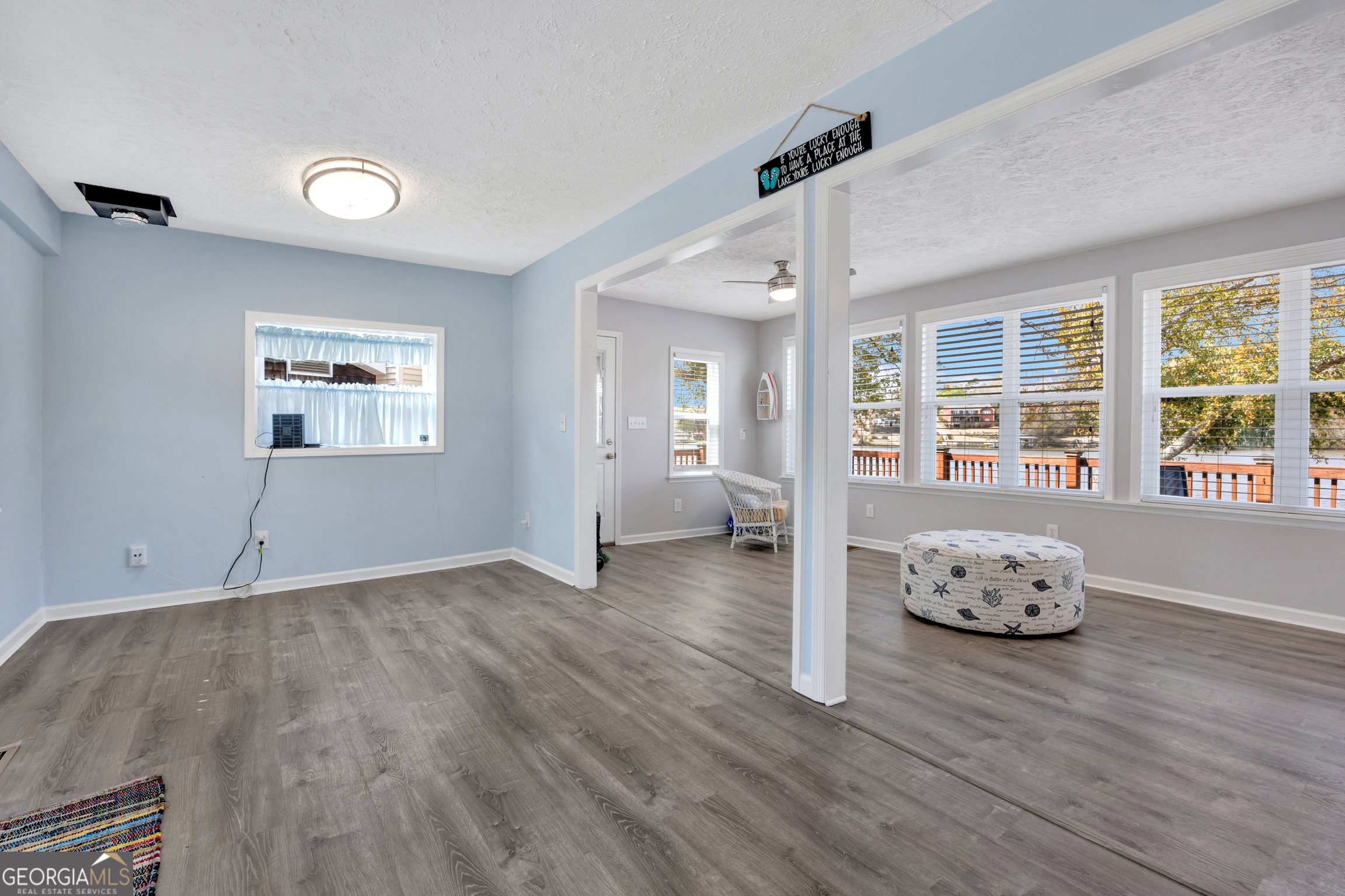 411 Alcovy Road Mansfield, GA 30055 - Photo 22 of 49 a view of a livingroom with wooden floor
