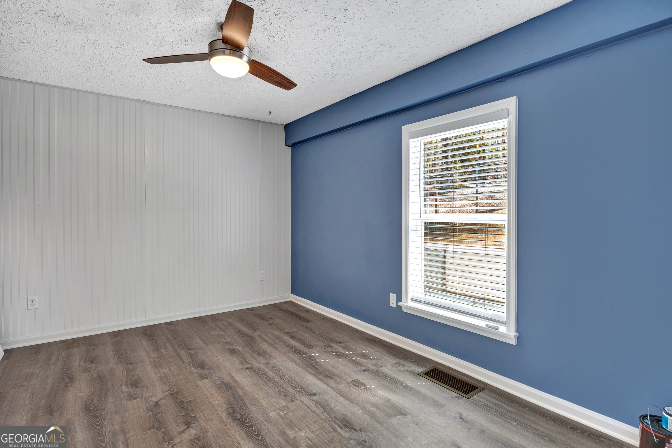 411 Alcovy Road Mansfield, GA 30055 - Photo 23 of 49 a view of an empty room with a window