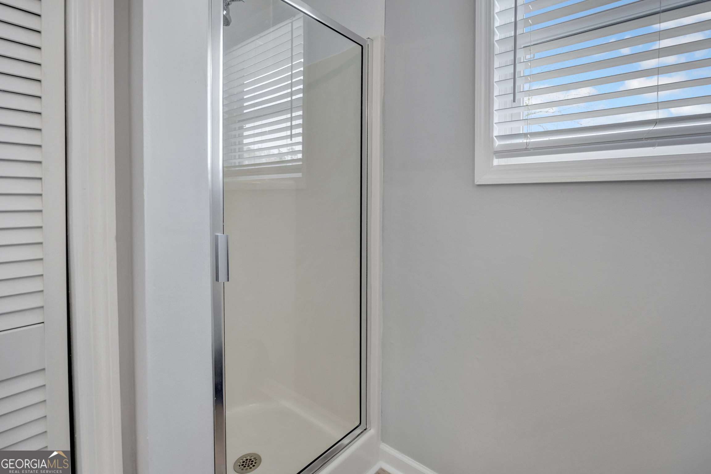 411 Alcovy Road Mansfield, GA 30055 - Photo 28 of 49 a bathroom with a window