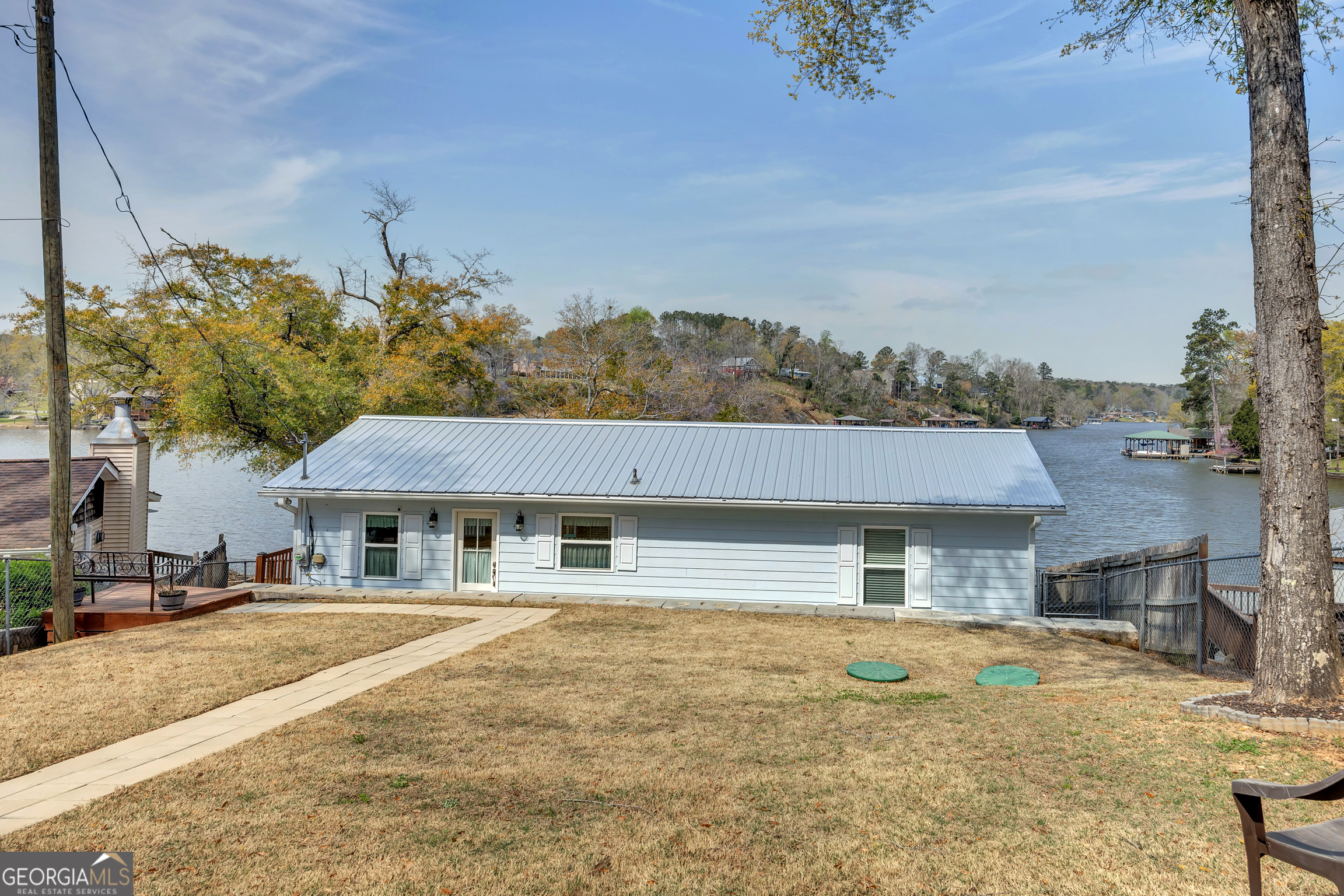411 Alcovy Road Mansfield, GA 30055 - Photo 32 of 49 a front view of a house with a yard