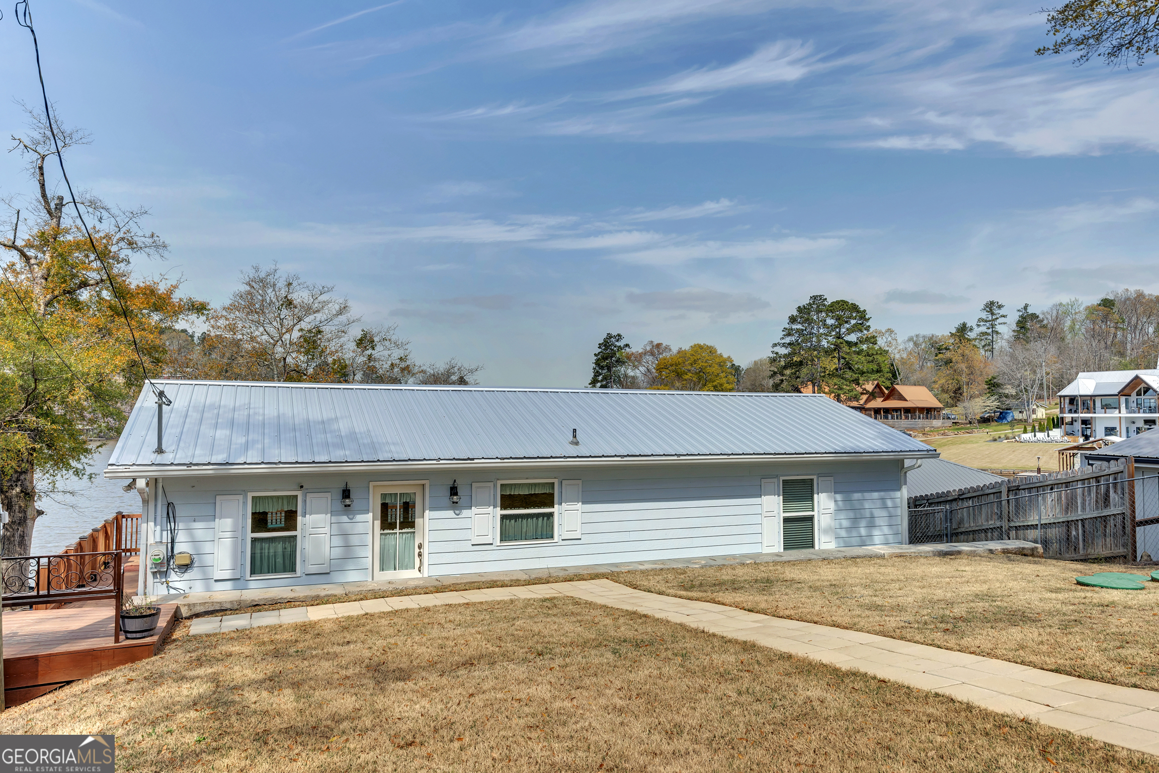 411 Alcovy Road Mansfield, GA 30055 - Photo 34 of 49 a front view of a house with a yard and garage