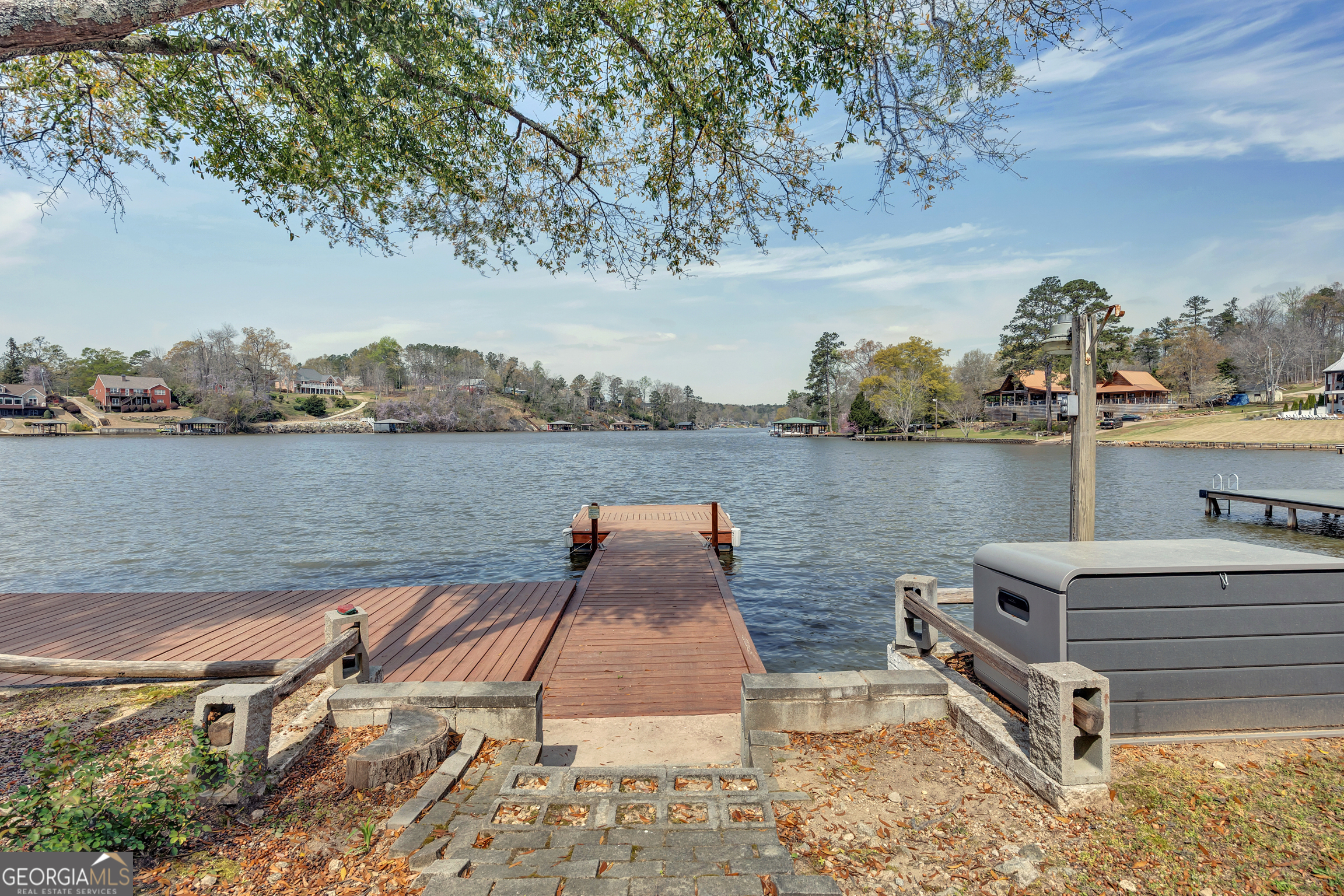 411 Alcovy Road Mansfield, GA 30055 - Photo 35 of 49 a view of a lake with sitting area and lake view