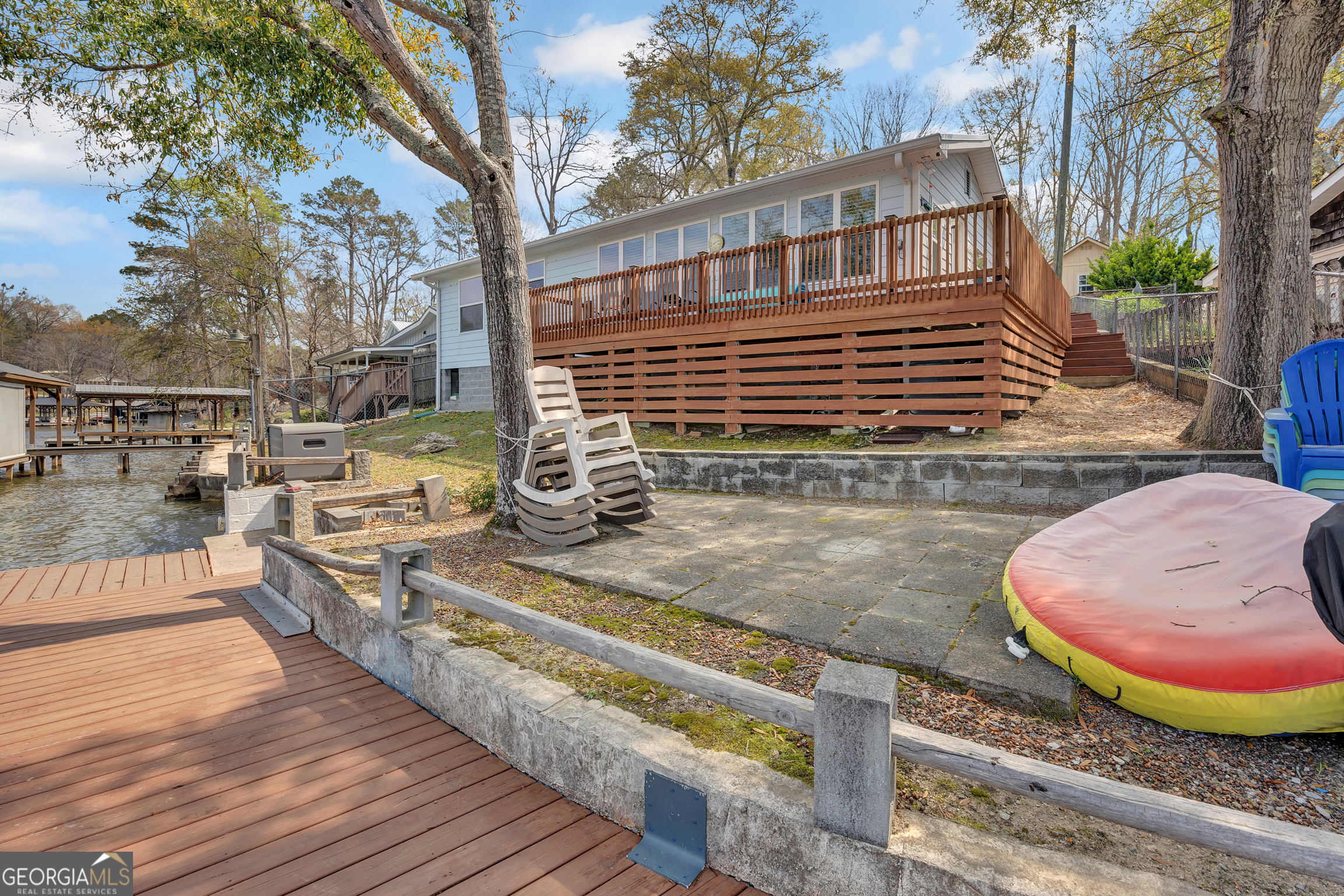 411 Alcovy Road Mansfield, GA 30055 - Photo 40 of 49 a view of a house with backyard and sitting area