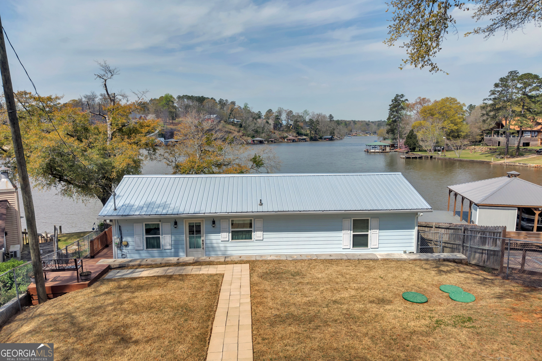 411 Alcovy Road Mansfield, GA 30055 - Photo 41 of 49 a aerial view of a house with swimming pool and large trees
