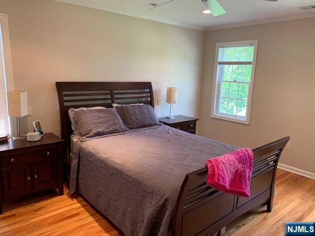 116 Prospect Street Paramus, NJ 07652 - Photo 10 of 17 a bedroom with a bed and window