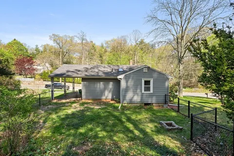 a house view with a garden space
