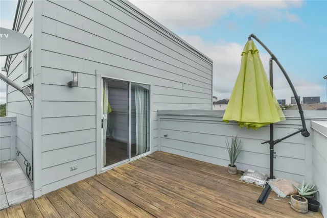 a room that has a bed and a table in it