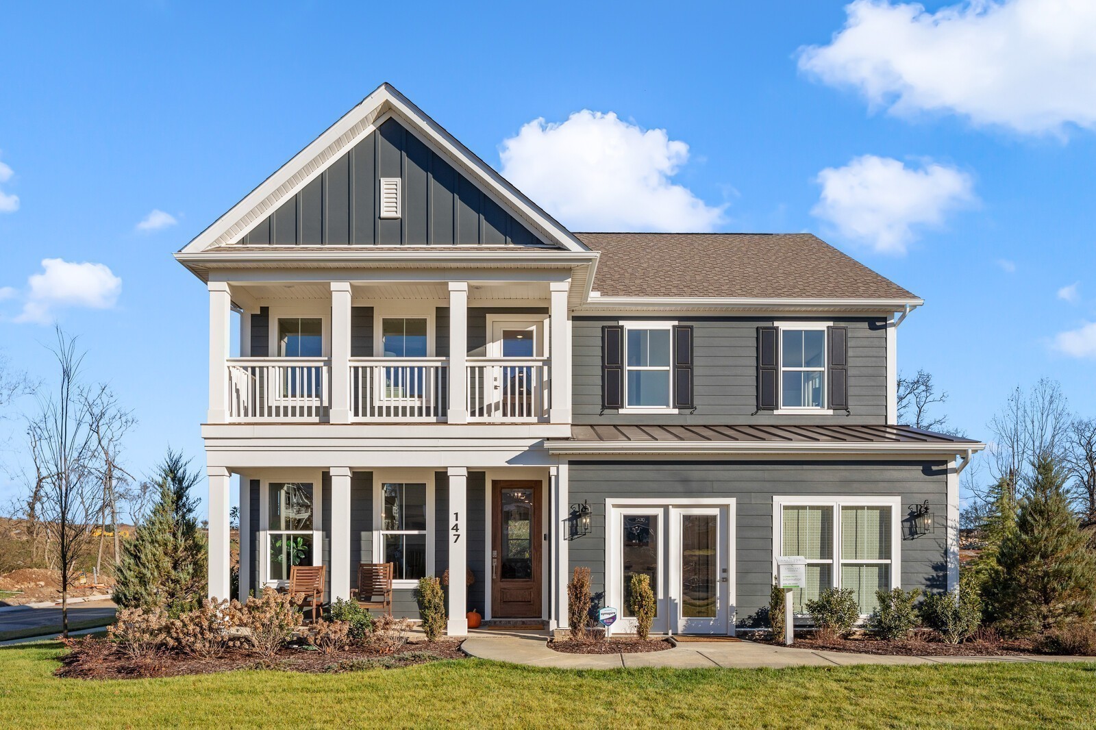 front view of a house with a yard