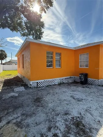 a kitchen with stainless steel appliances a stove and a refrigerator