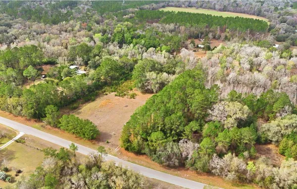 a view of swimming pool from a balcony