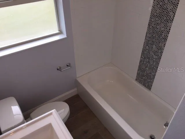 a bathroom with a bathtub