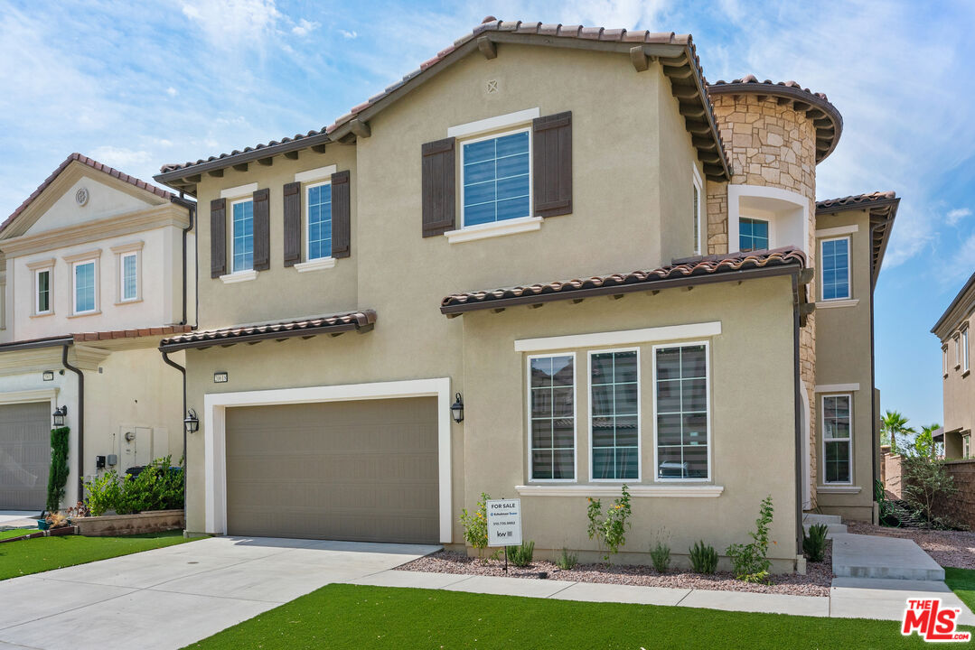 20618 West Wood Rose Court Porter Ranch, CA 91326 - Photo 6 of 44 a front view of a house