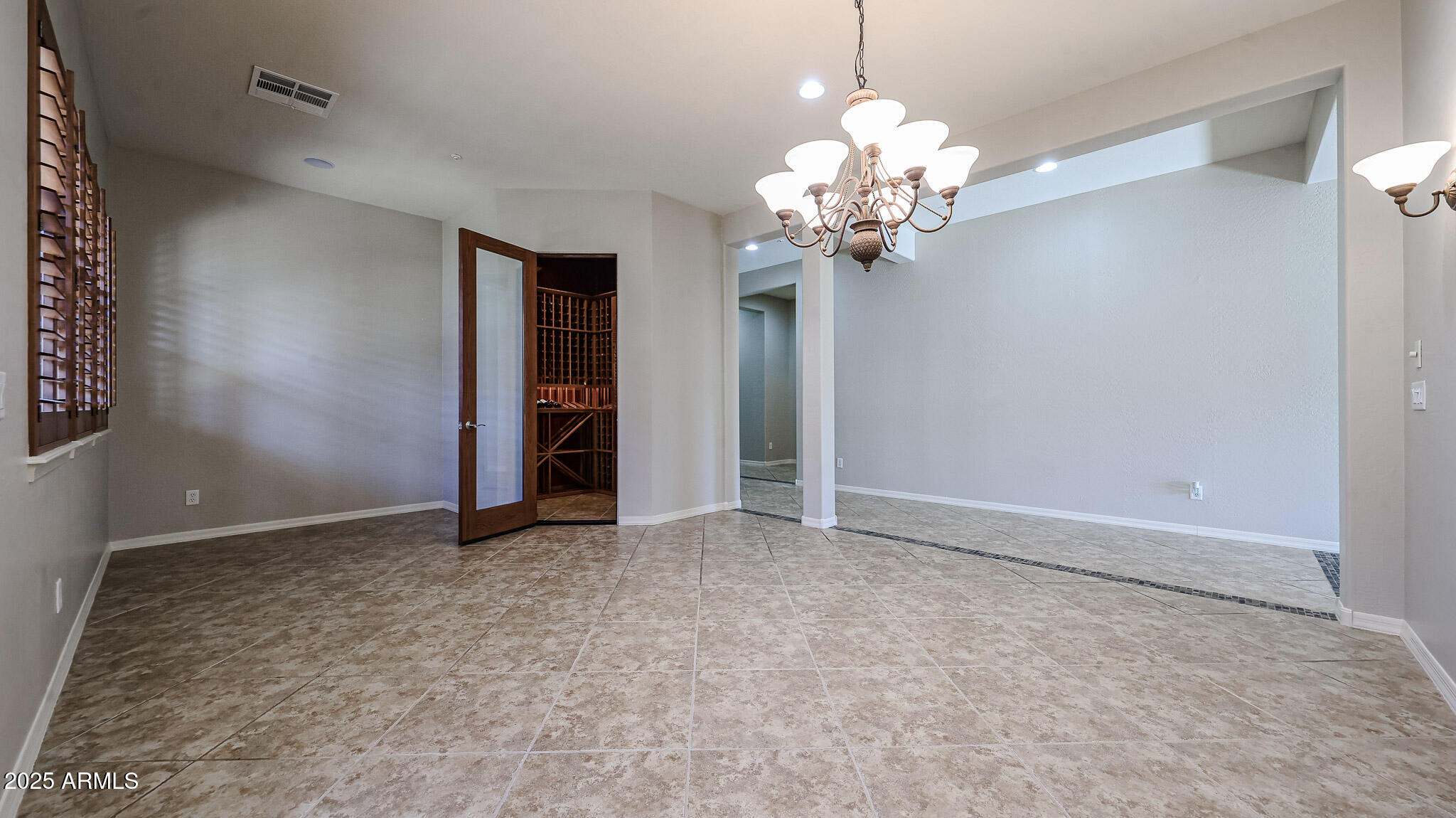 18391 Verdin Road Goodyear, AZ 85338 - Photo 14 of 94 Door to Wine Room