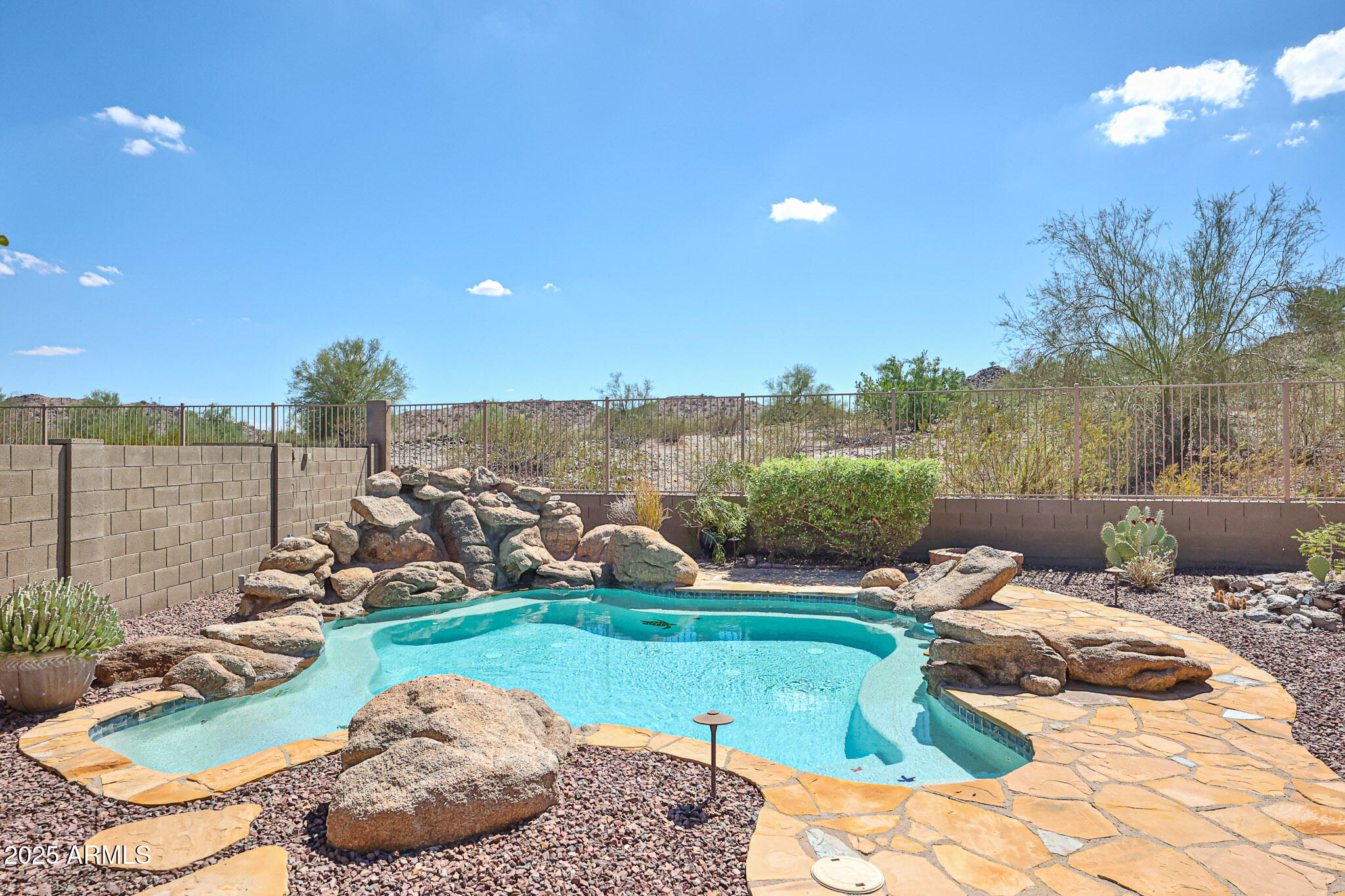 18391 Verdin Road Goodyear, AZ 85338 - Photo 51 of 94 Pool with Mountains Behind