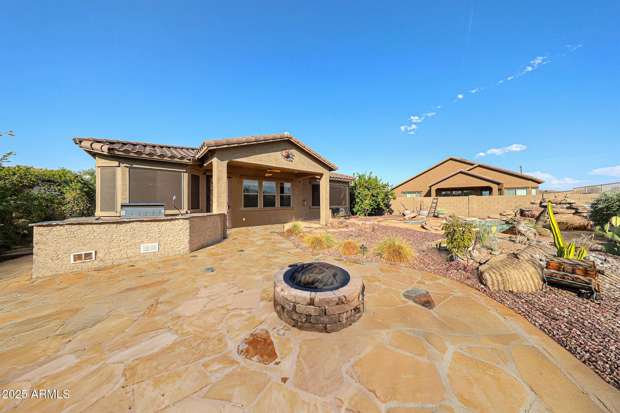 18391 Verdin Road Goodyear, AZ 85338 - Photo 54 of 94 Covered back Patio and Fire Pit