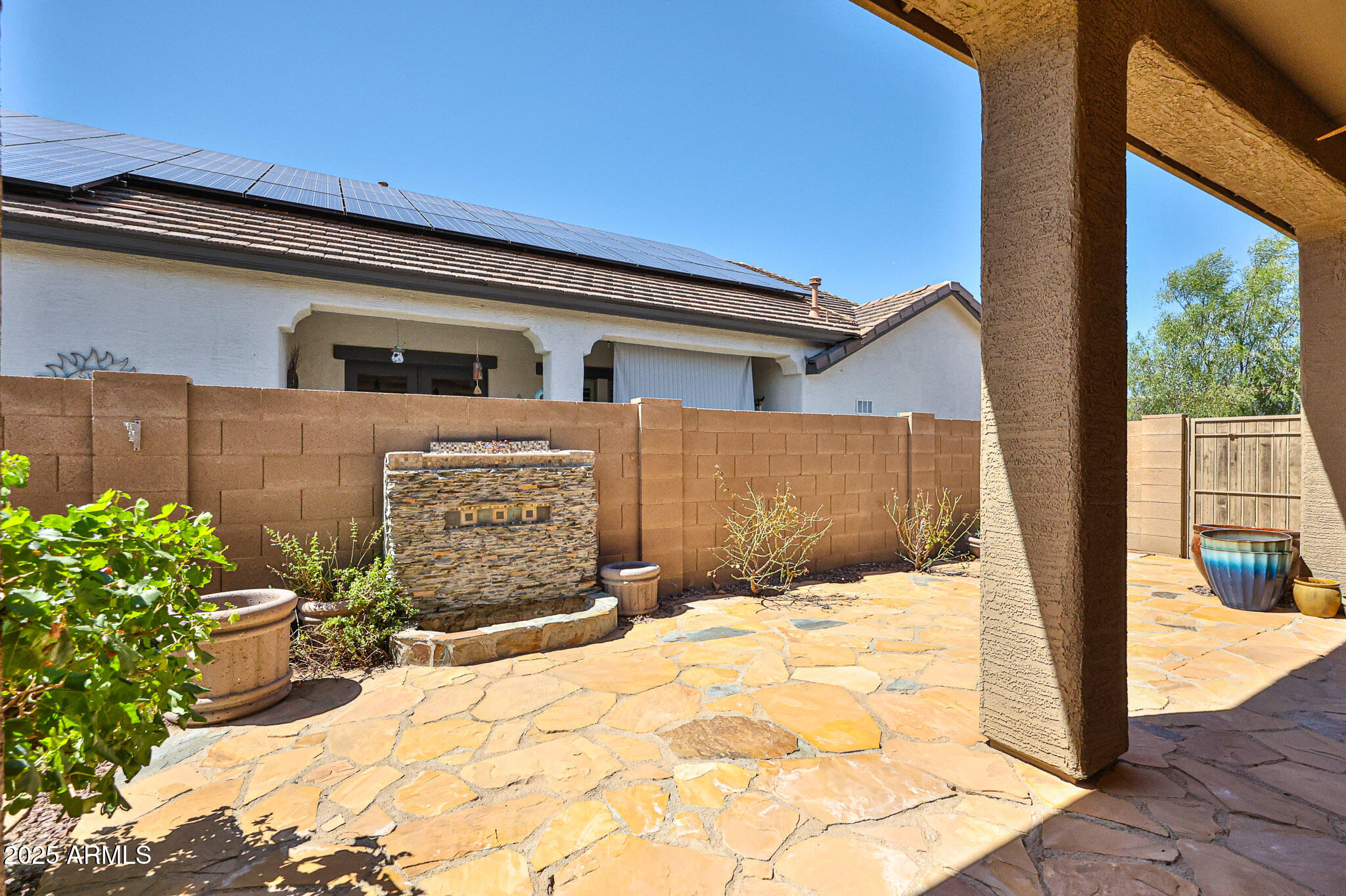 18391 Verdin Road Goodyear, AZ 85338 - Photo 59 of 94 a front view of a house with a yard