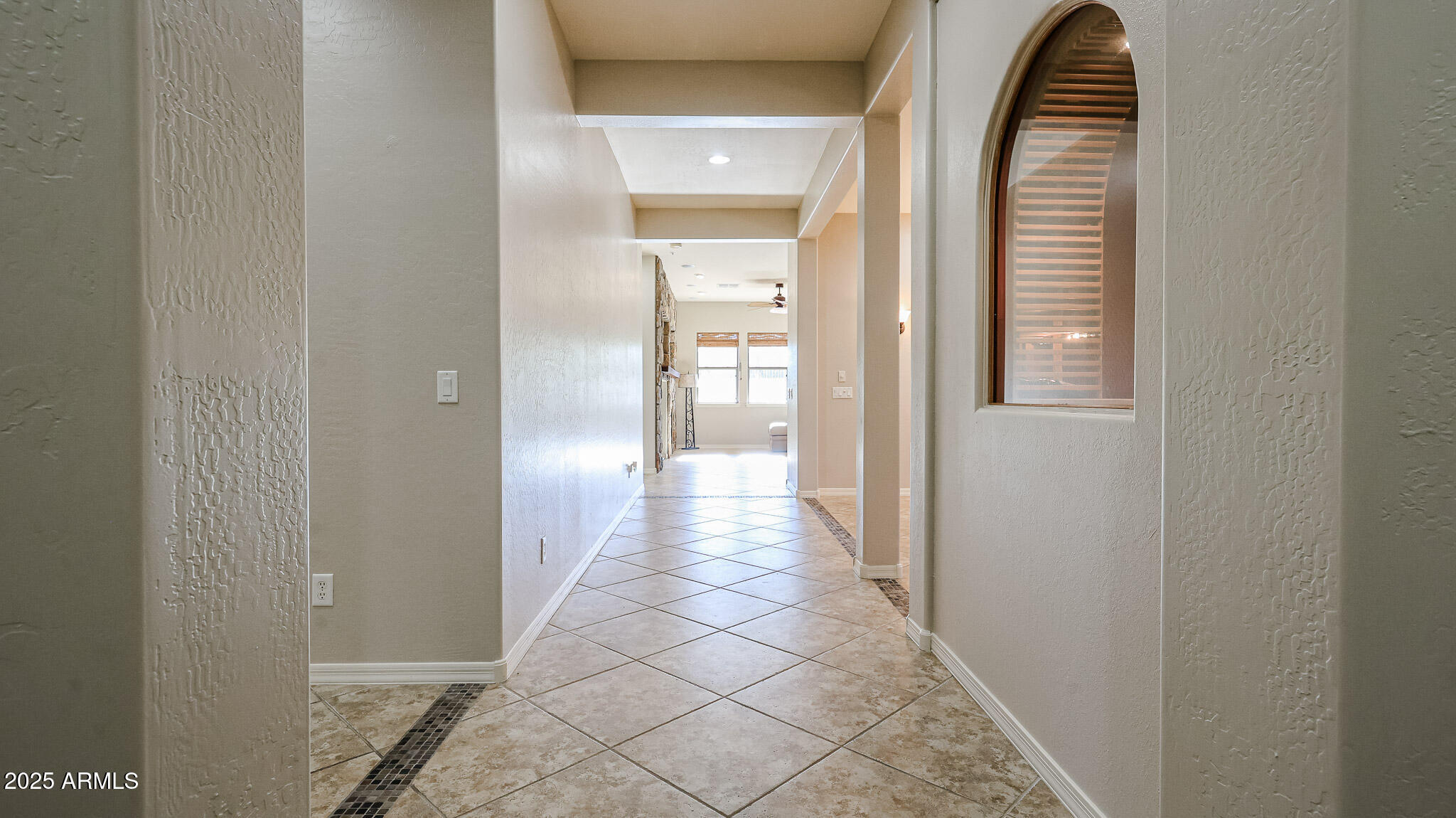 18391 Verdin Road Goodyear, AZ 85338 - Photo 8 of 94 Hallway to Great Room
