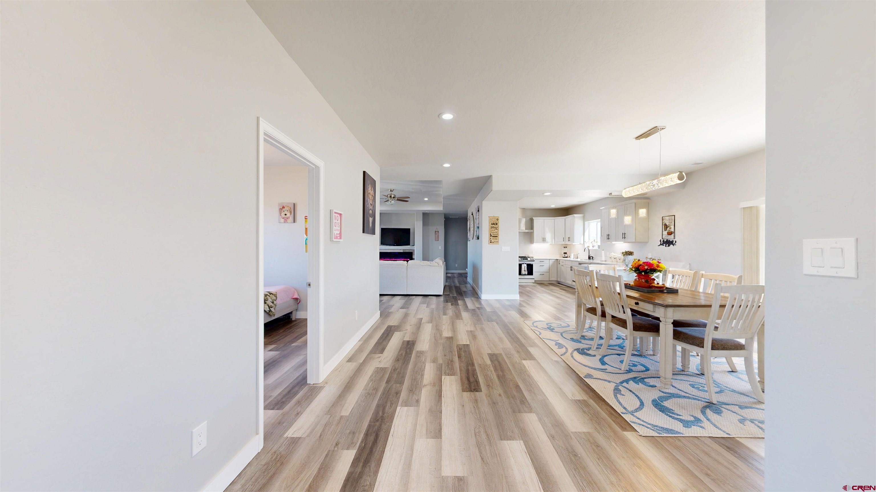 3728 Ruth Lane Delta, CO 81416 - Photo 13 of 34 a view of a living room and kitchen with furniture