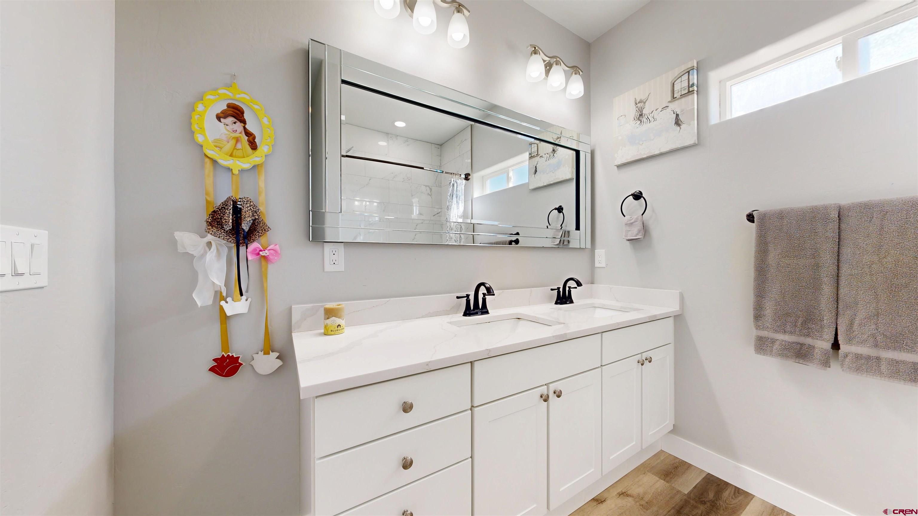 3728 Ruth Lane Delta, CO 81416 - Photo 19 of 34 a bathroom with a sink and a mirror